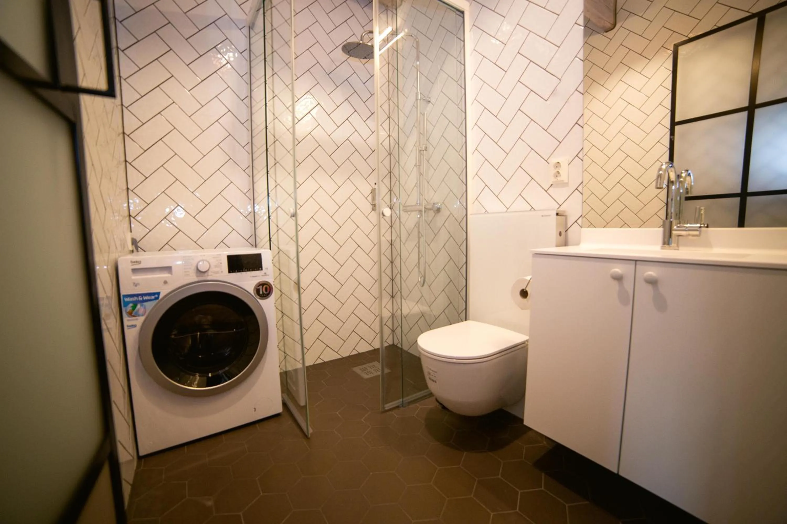 Bathroom in Home Again Apartments Kirkegata