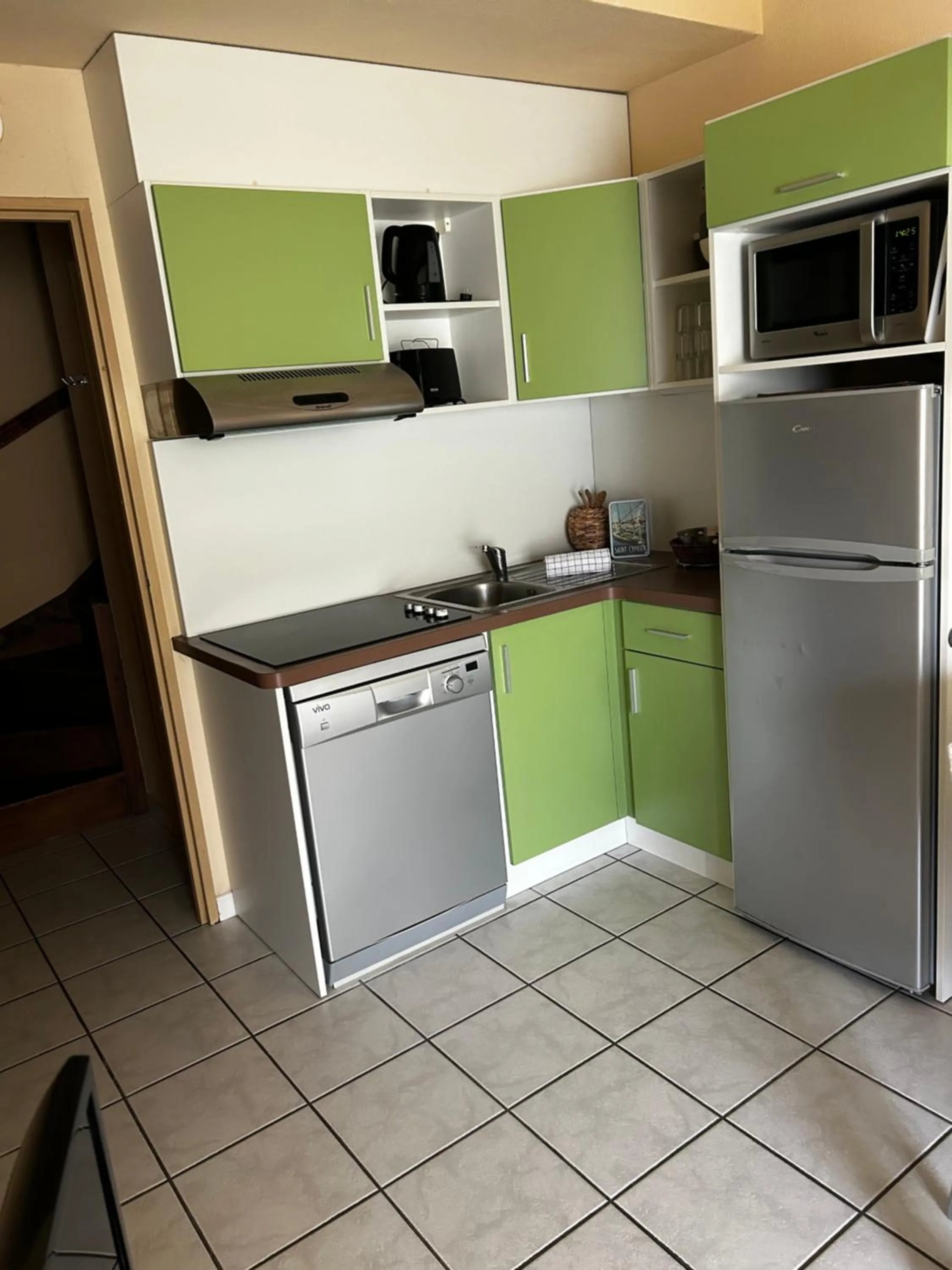 Kitchen or kitchenette in Lagrange Grand Bleu Vacances – Résidence Les Jardins de Neptune