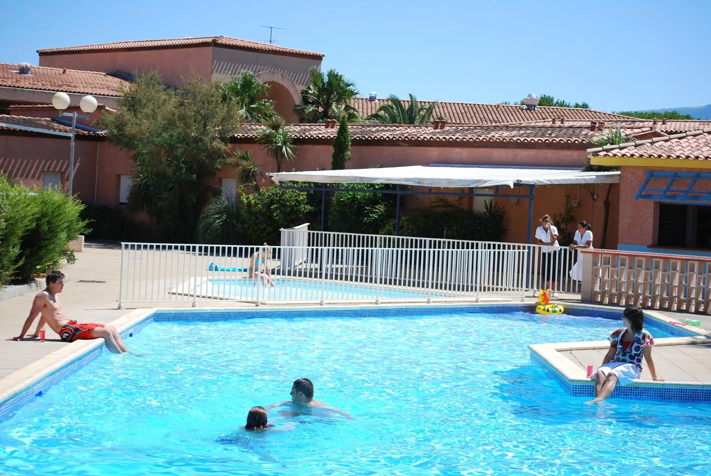 Swimming pool in Lagrange Grand Bleu Vacances – Résidence Les Jardins de Neptune