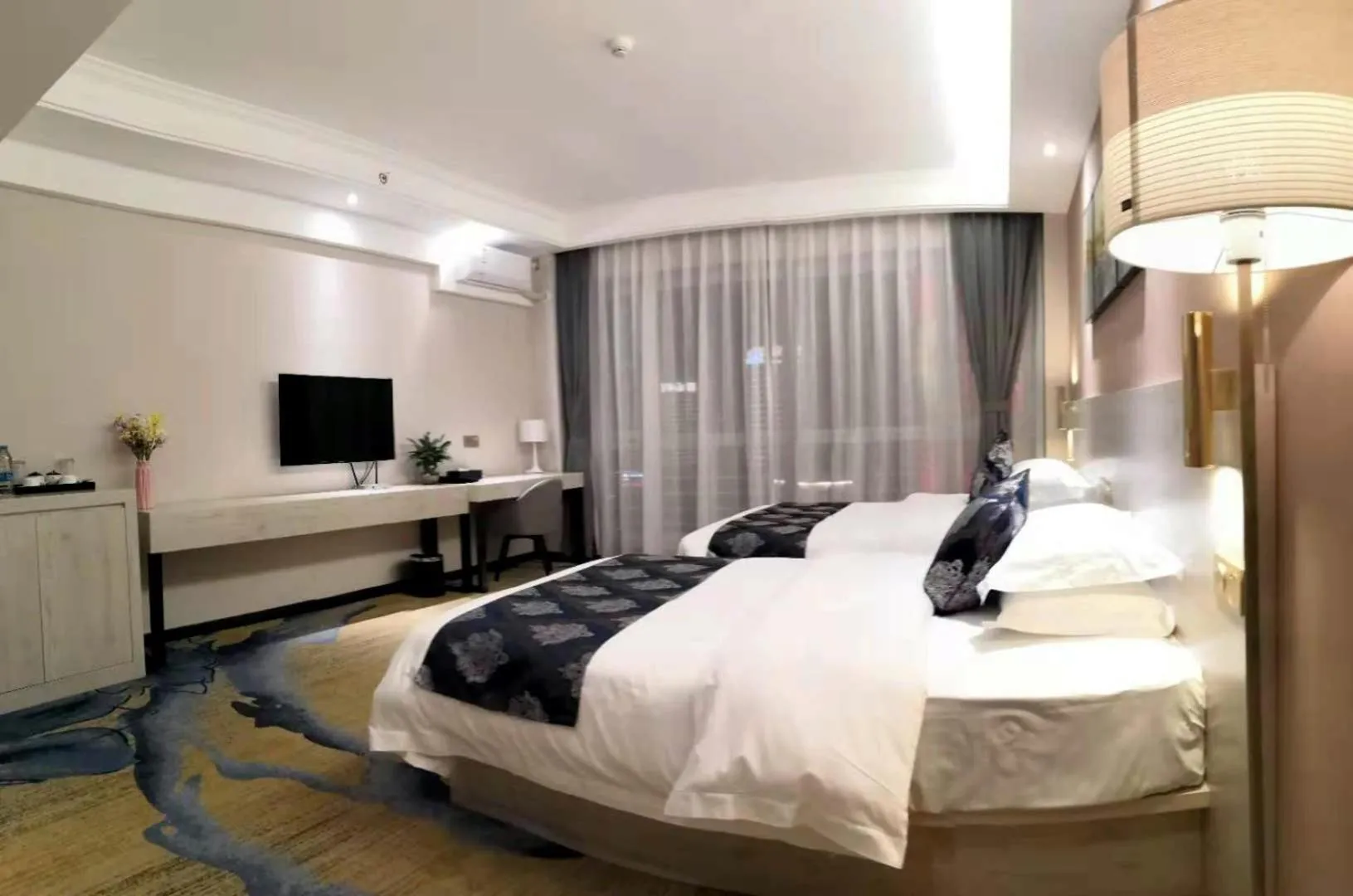 Bed in Demei Boutique Hotel