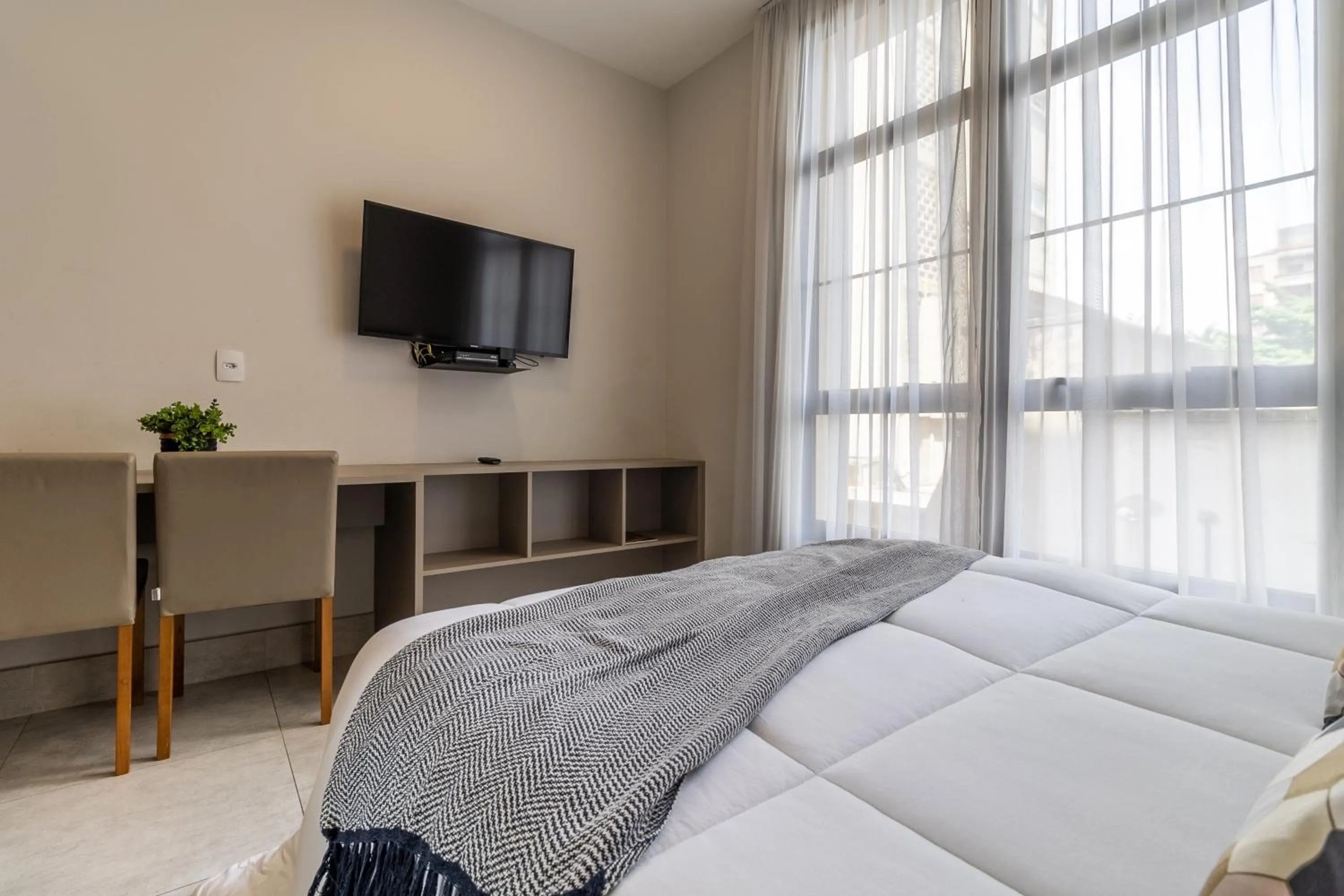 Communal lounge/ TV room, Bed in Jacques Pilon Residence