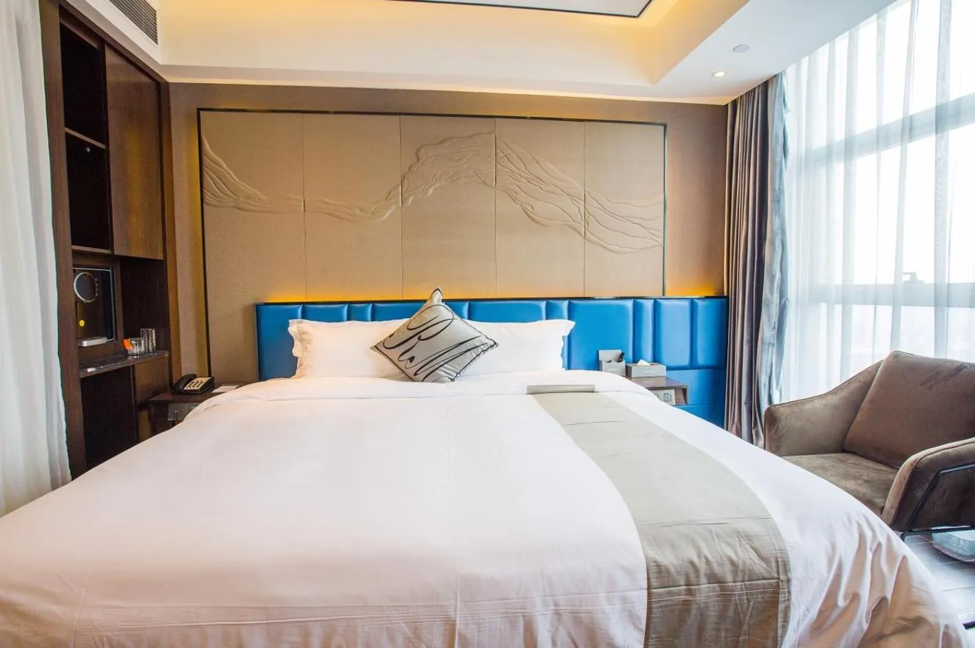 Bed in Ruiman International Hotel