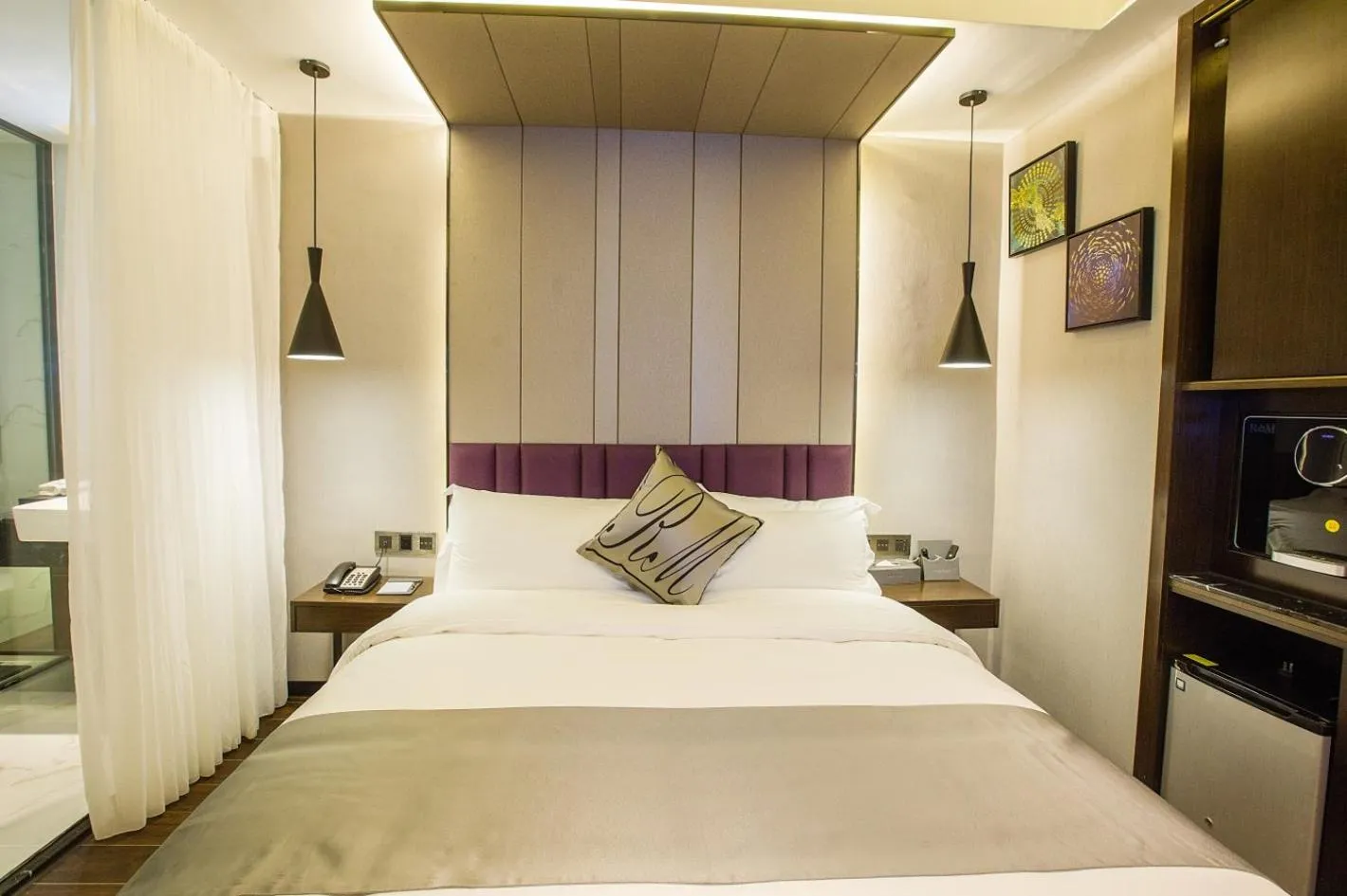 Bed in Ruiman International Hotel