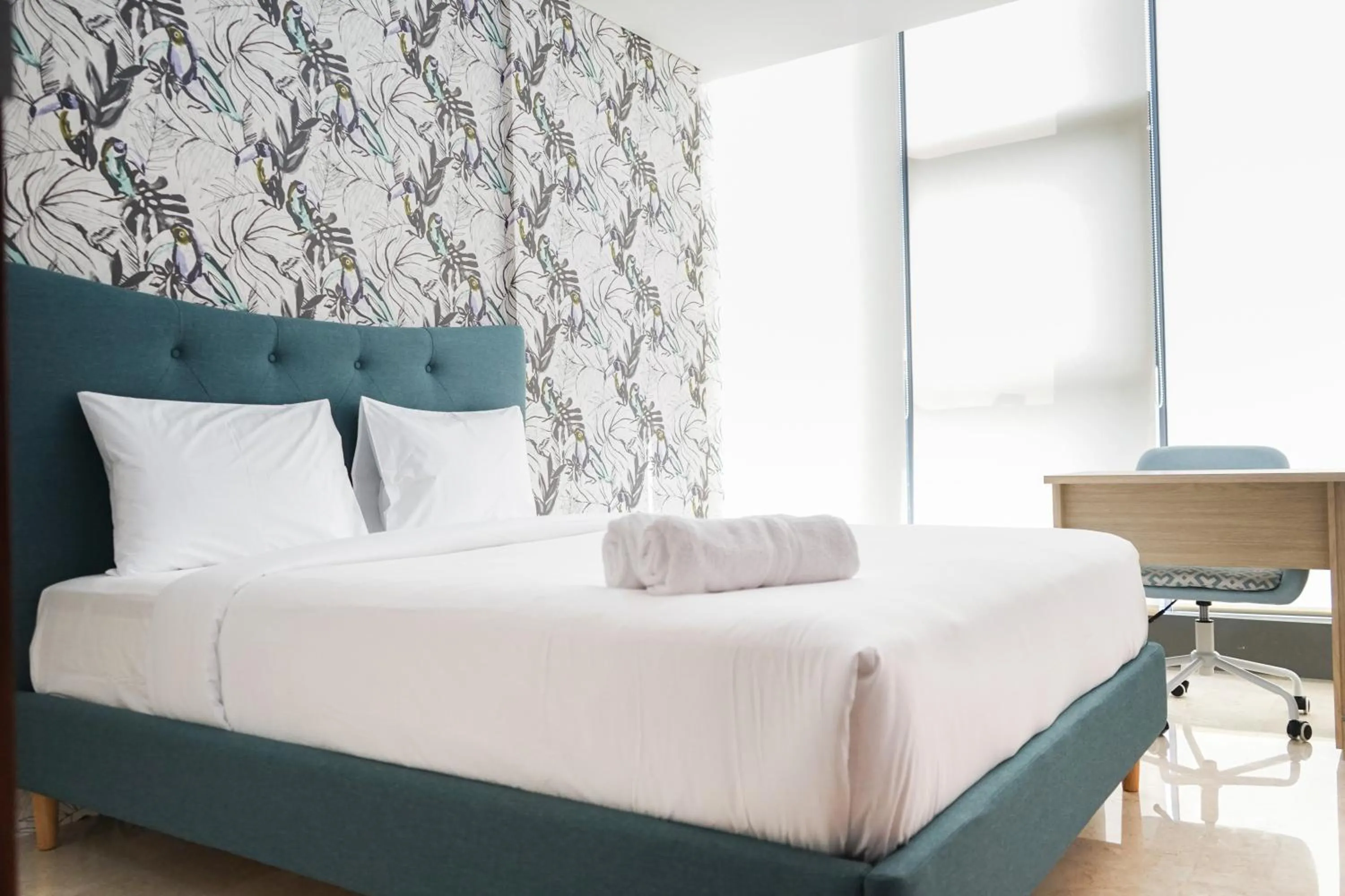 South Tower 2BR at L'Avenue Apartment By Travelio