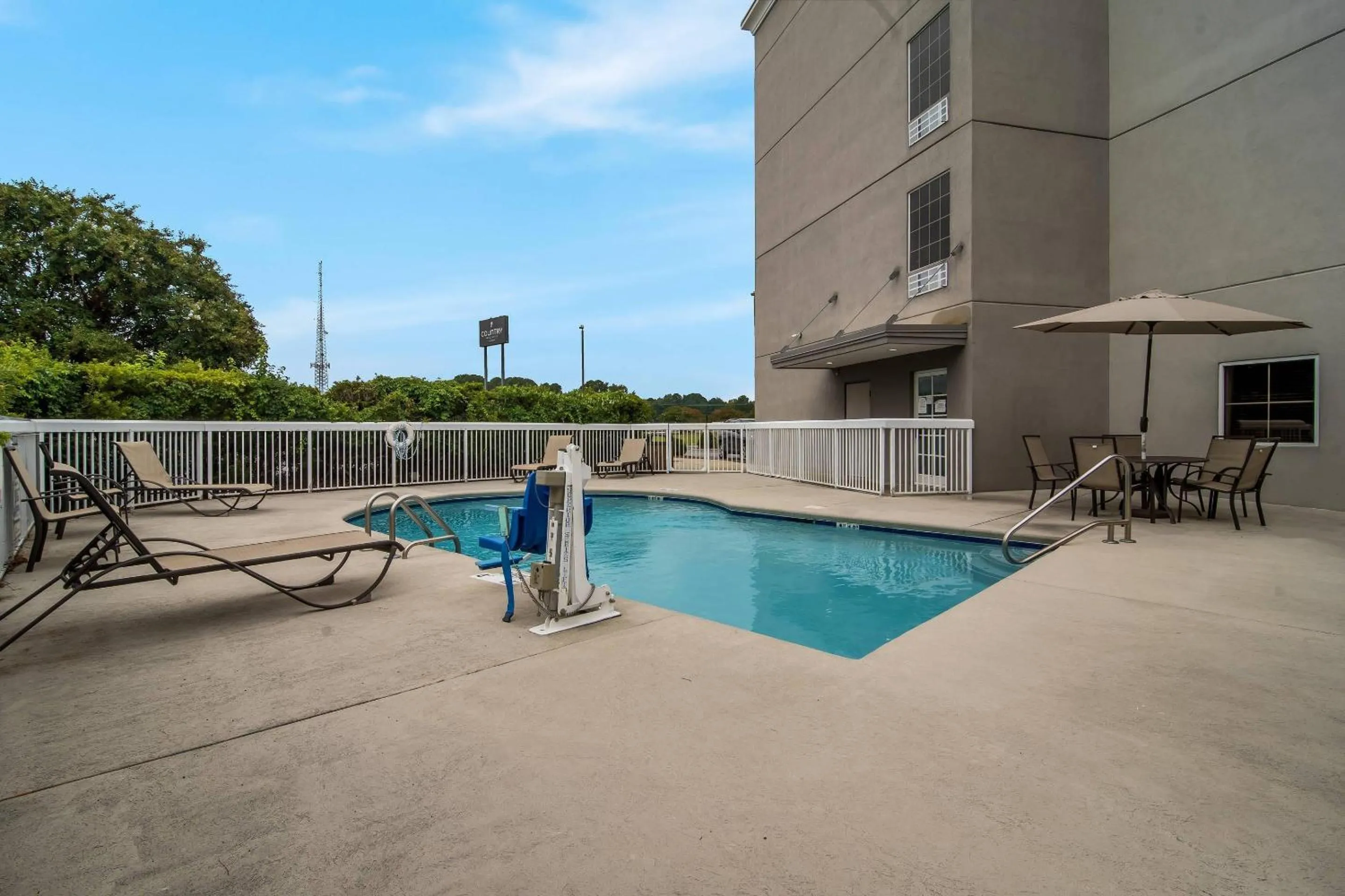 Swimming pool in Country Inn & Suites by Radisson, Goldsboro, NC