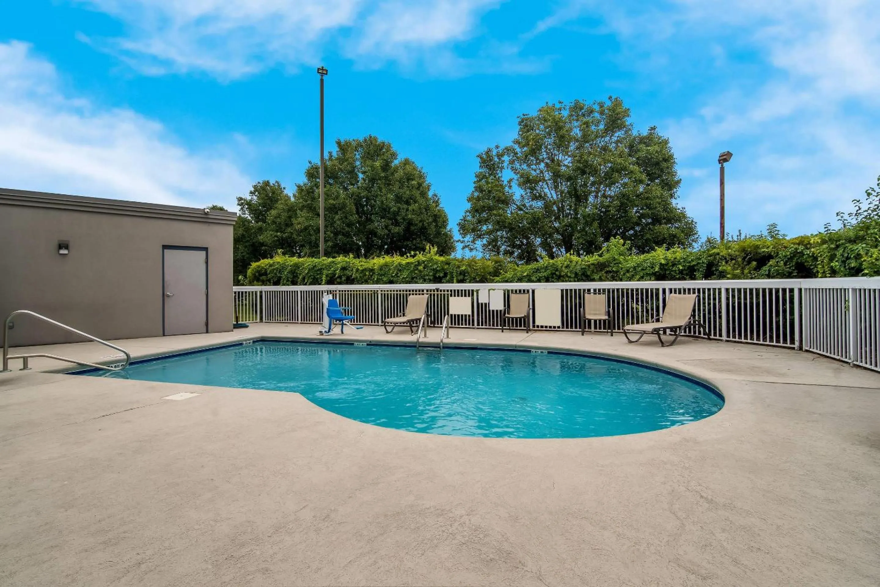 Swimming pool in Country Inn & Suites by Radisson, Goldsboro, NC