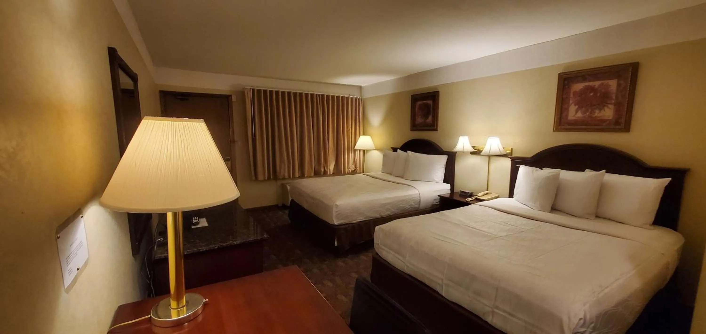 Bed in Americas Best Value Inn Chippewa Falls