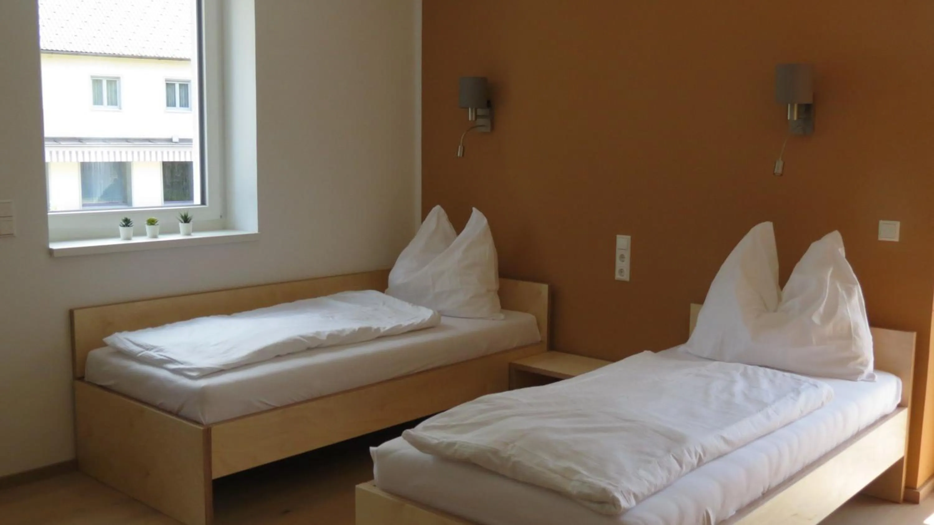 Bed in Gästehaus Eisenstrasse