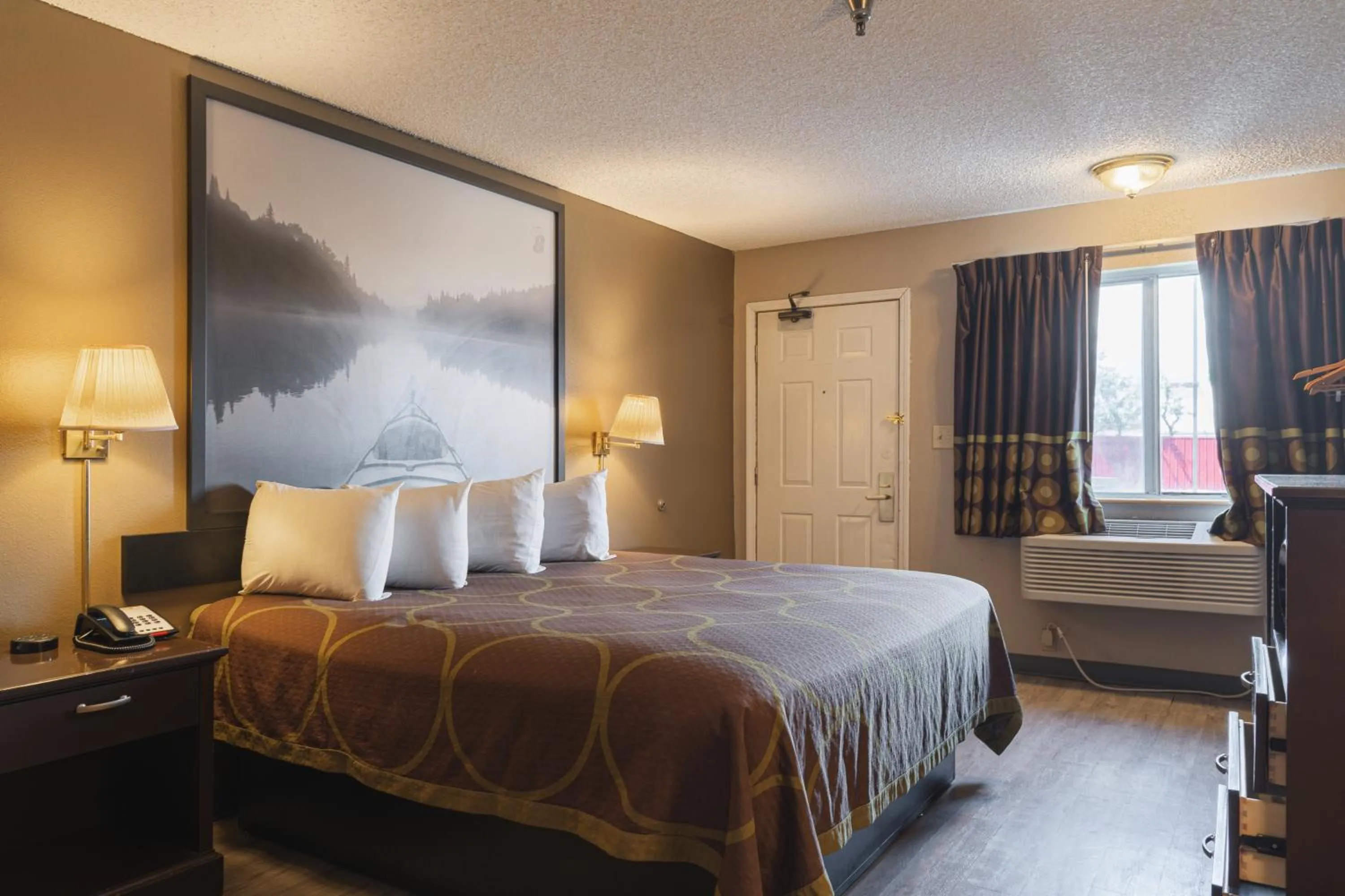 Bed in Super 8 by Wyndham Grants