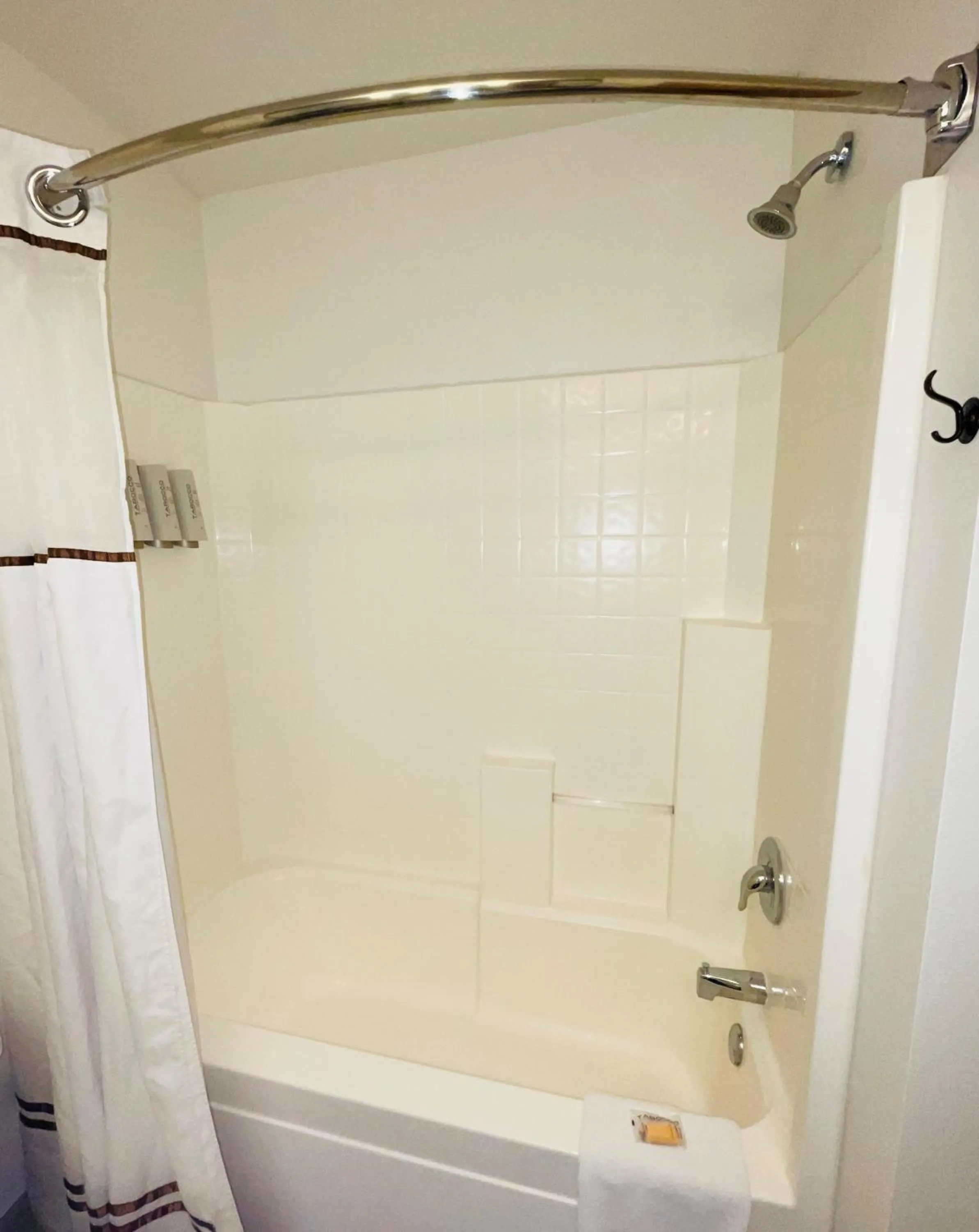 Shower in Boothill Inn and Suites