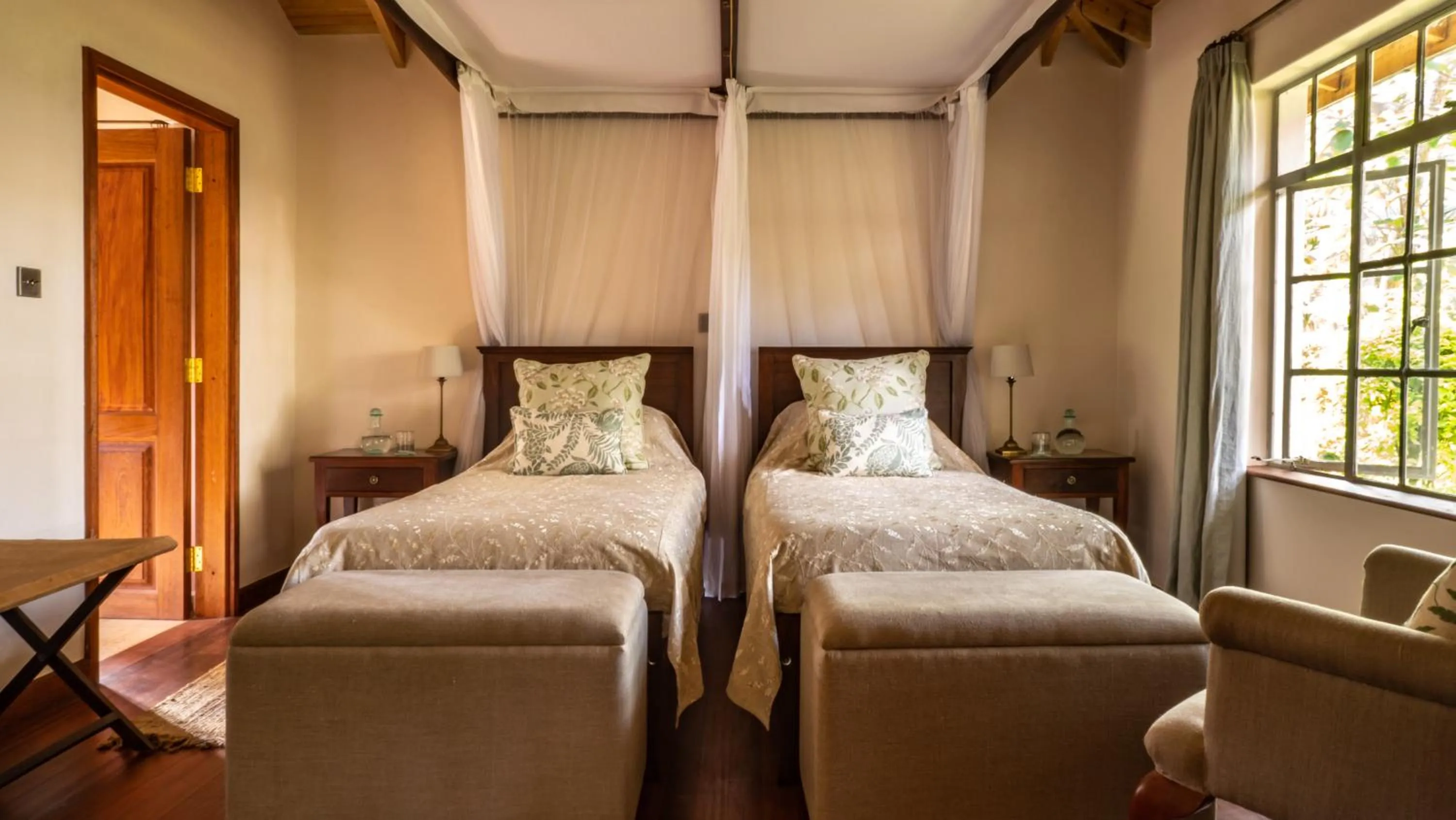 Bed in Karen Blixen Coffee Garden & Cottages