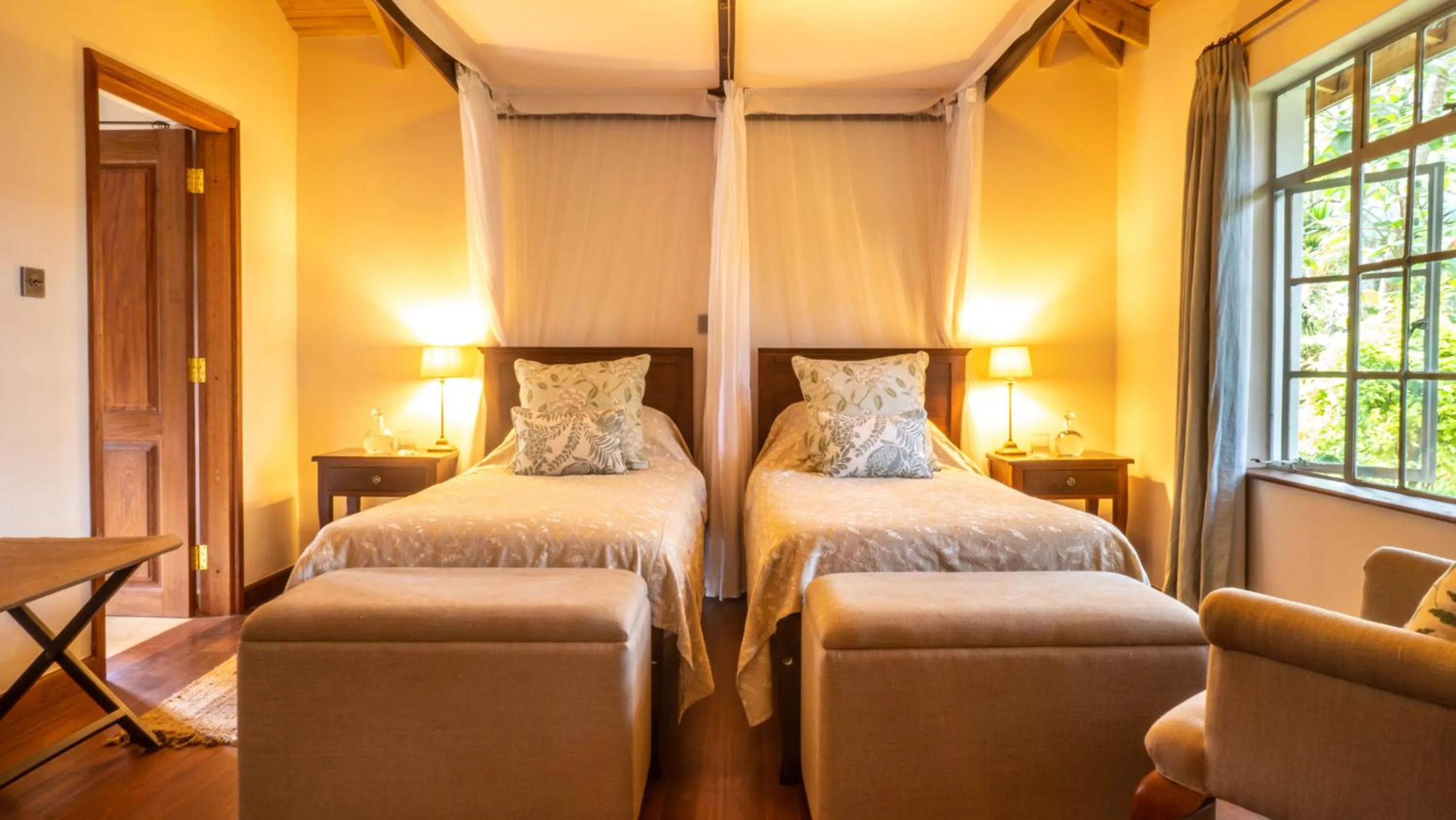 Bed in Karen Blixen Coffee Garden & Cottages