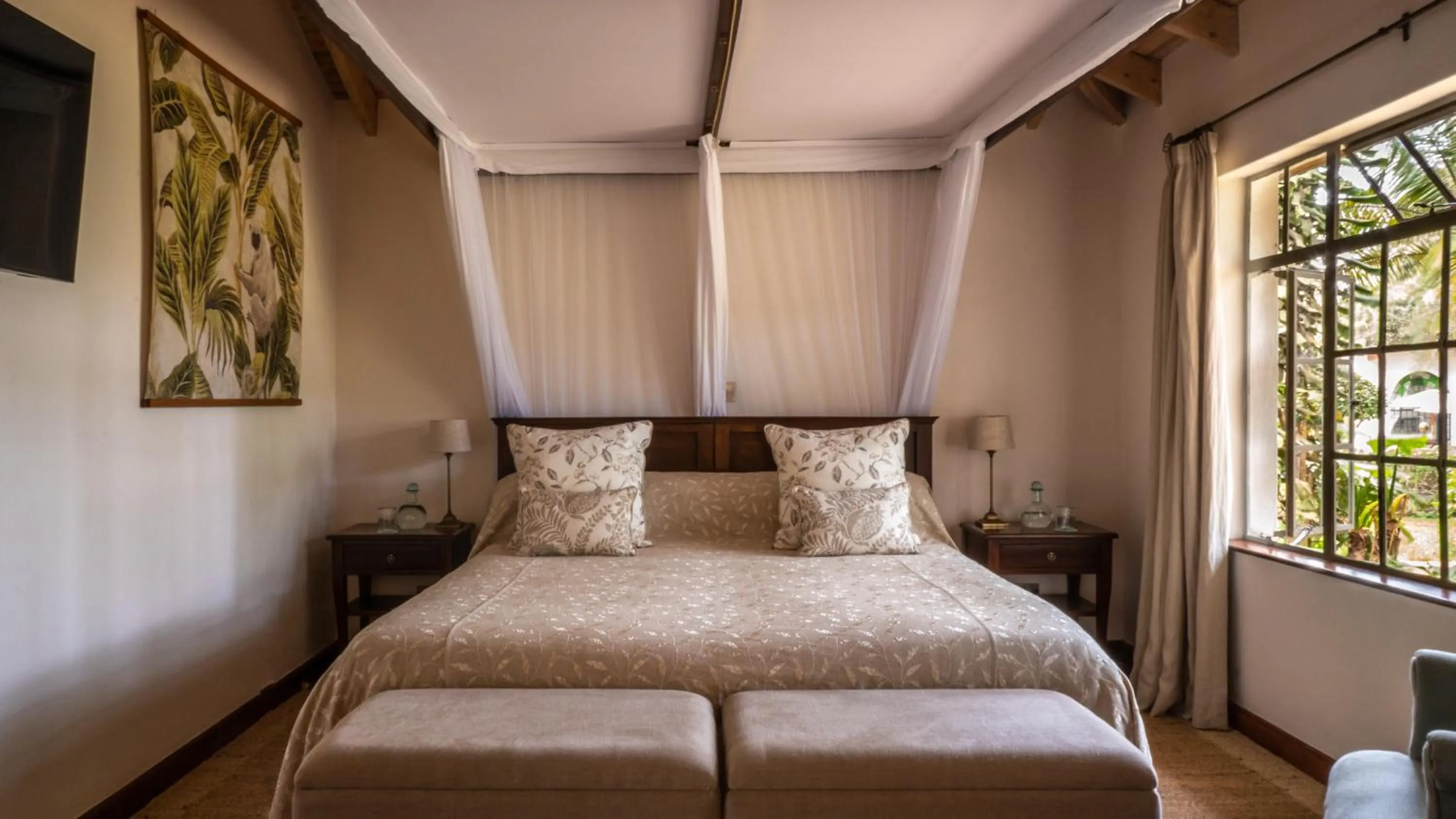 Bed in Karen Blixen Coffee Garden & Cottages