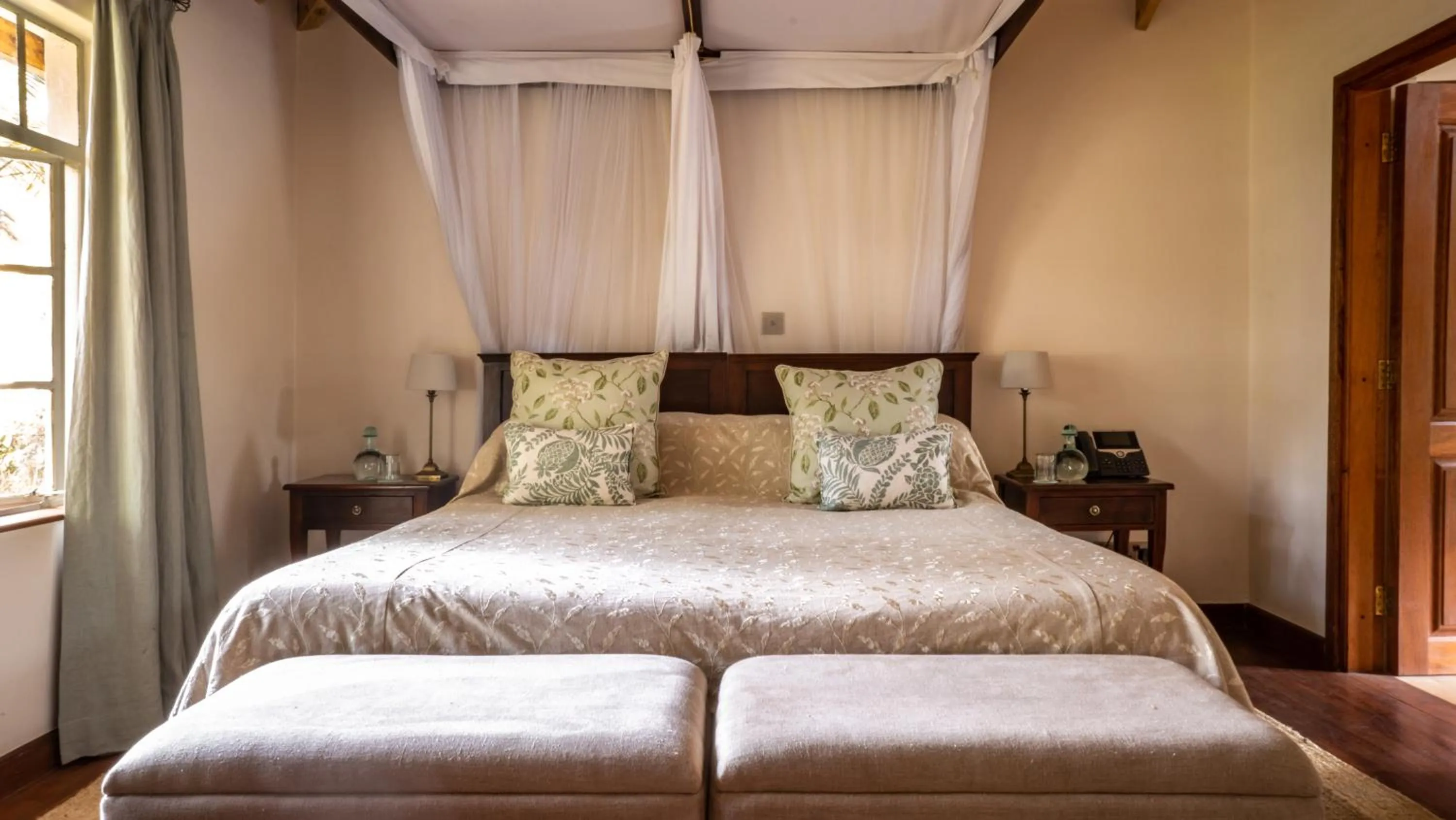 Bed in Karen Blixen Coffee Garden & Cottages