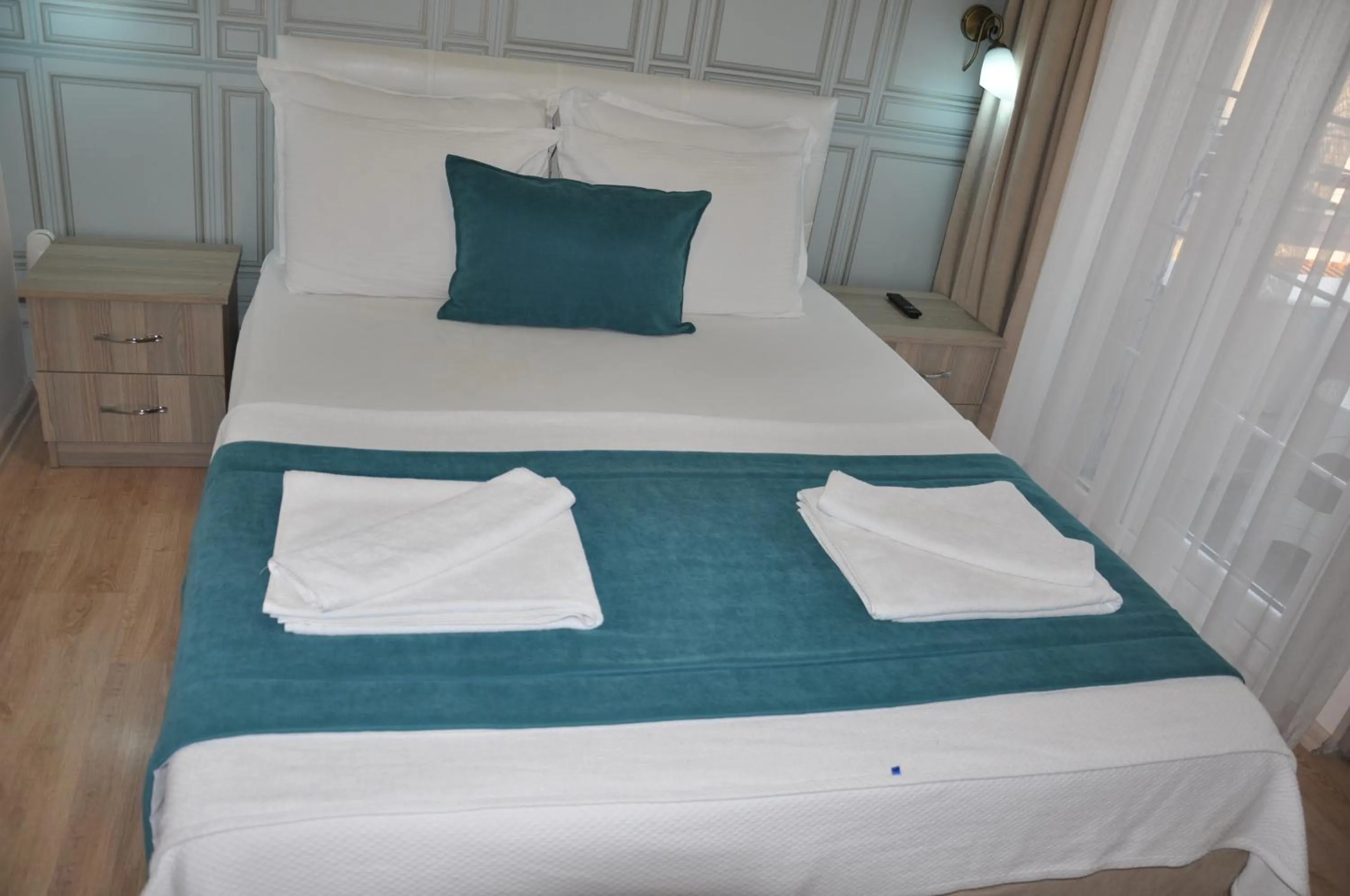 Photo of the whole room, Bed in Neoss Boutique Hotel