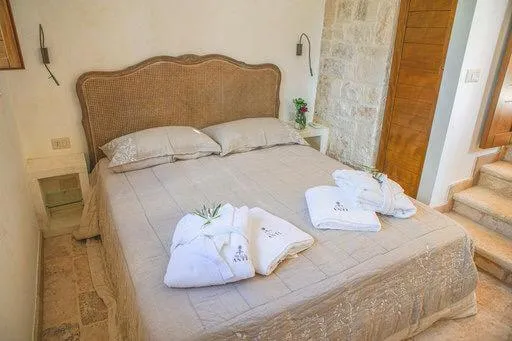 Bed in Trullo Grace -Trulli Anti' Charme & Relax