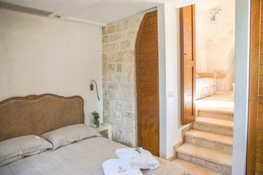 Bed in Trullo Grace -Trulli Anti' Charme & Relax