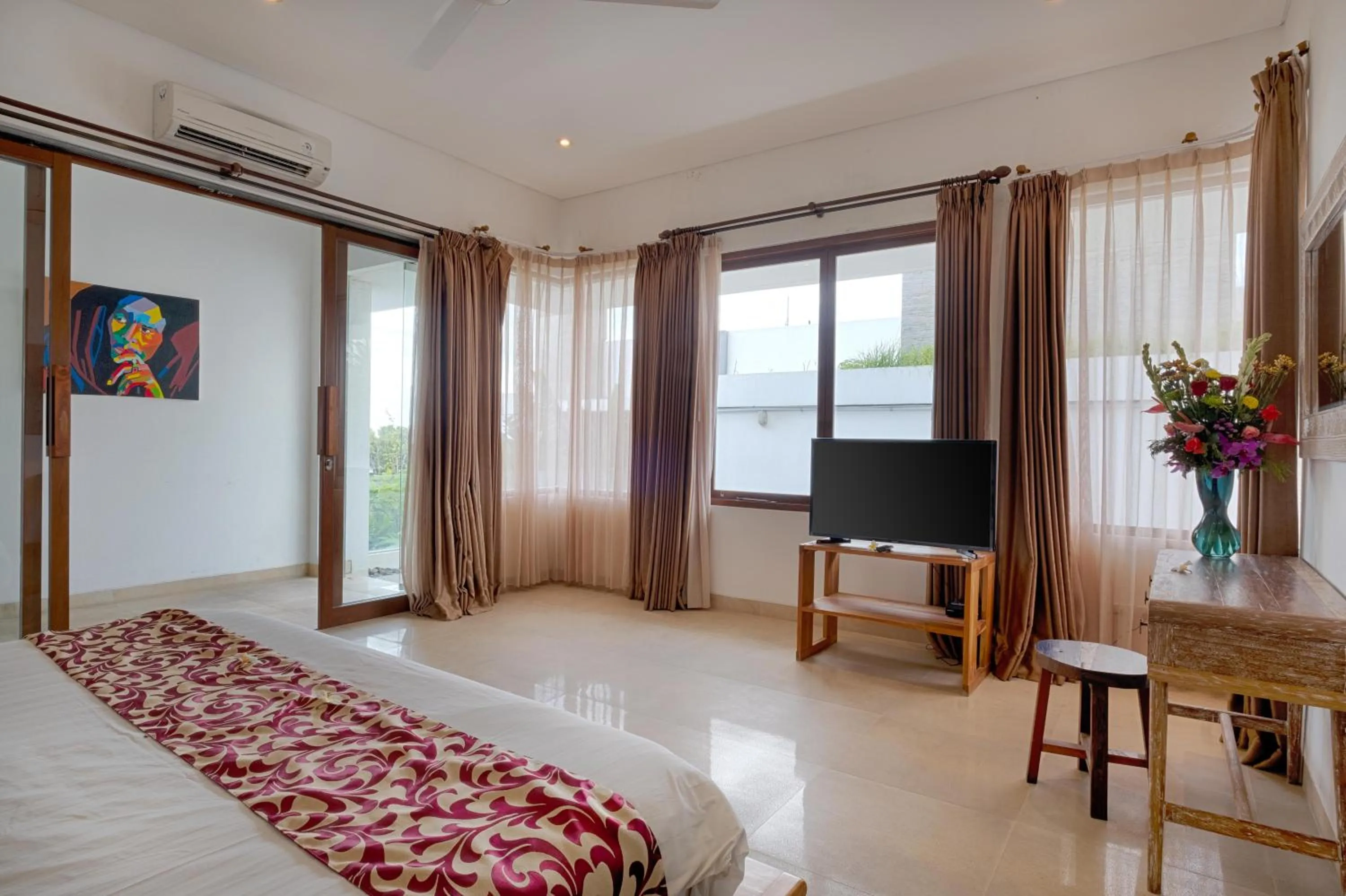 Bed in Keramas Beachfront Villa by Sanga Sanga Hospitality