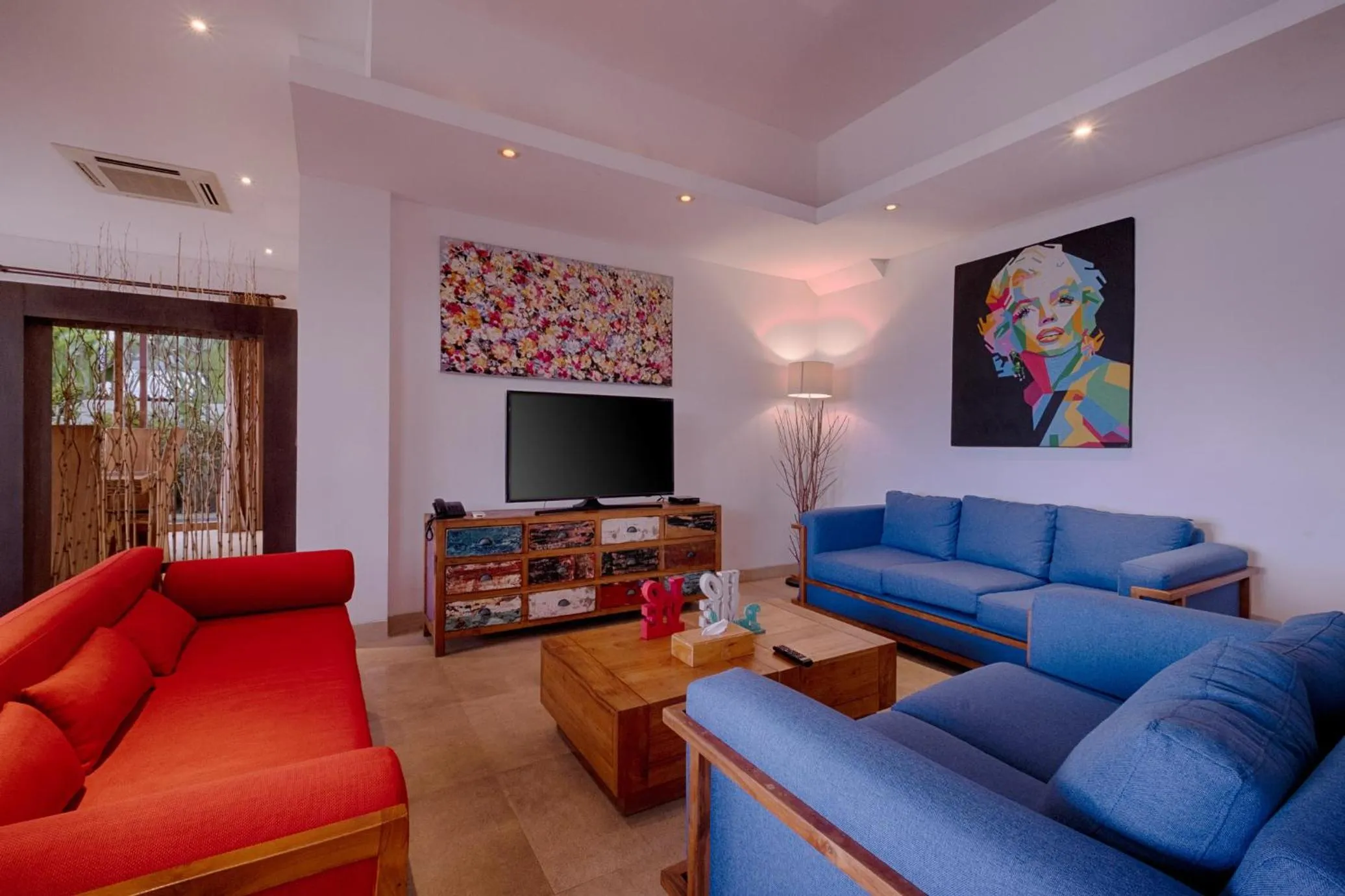 Living room in Keramas Beachfront Villa by Sanga Sanga Hospitality