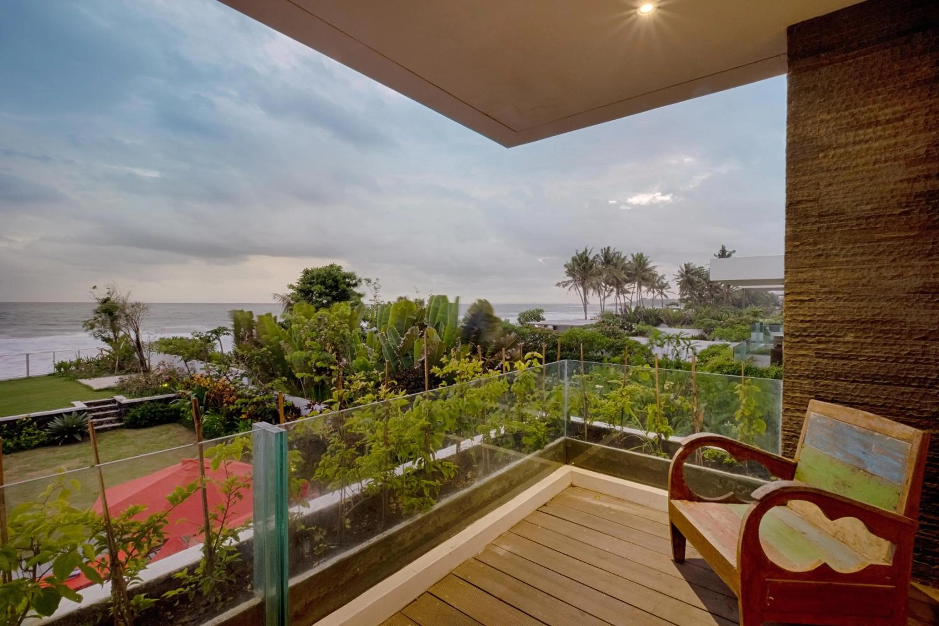Balcony/Terrace in Keramas Beachfront Villa by Sanga Sanga Hospitality
