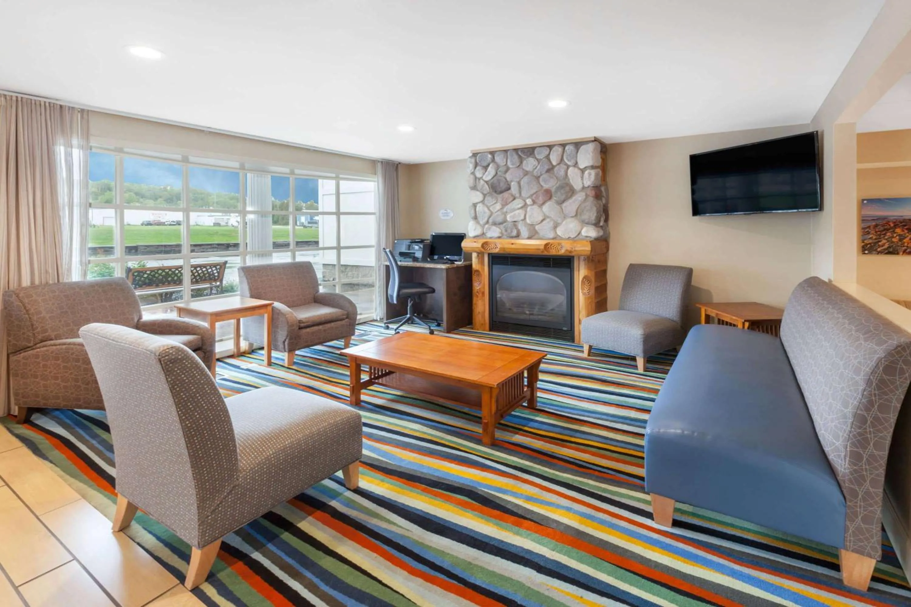 Lobby or reception in Baymont by Wyndham St. Ignace Lakefront