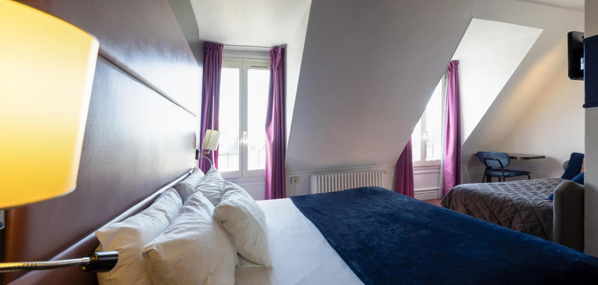 Photo of the whole room, Bed in Accueil Hôtel Paris Pigalle Montmartre