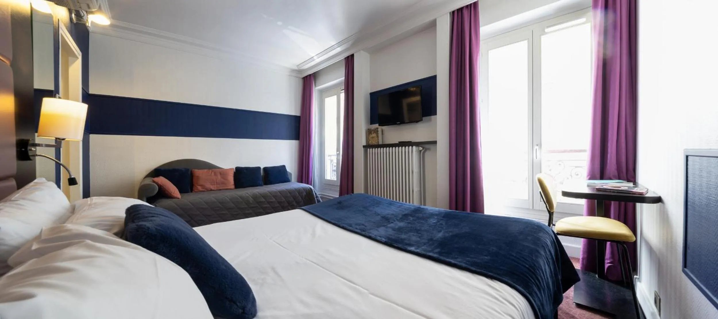 Photo of the whole room, Bed in Accueil Hôtel Paris Pigalle Montmartre