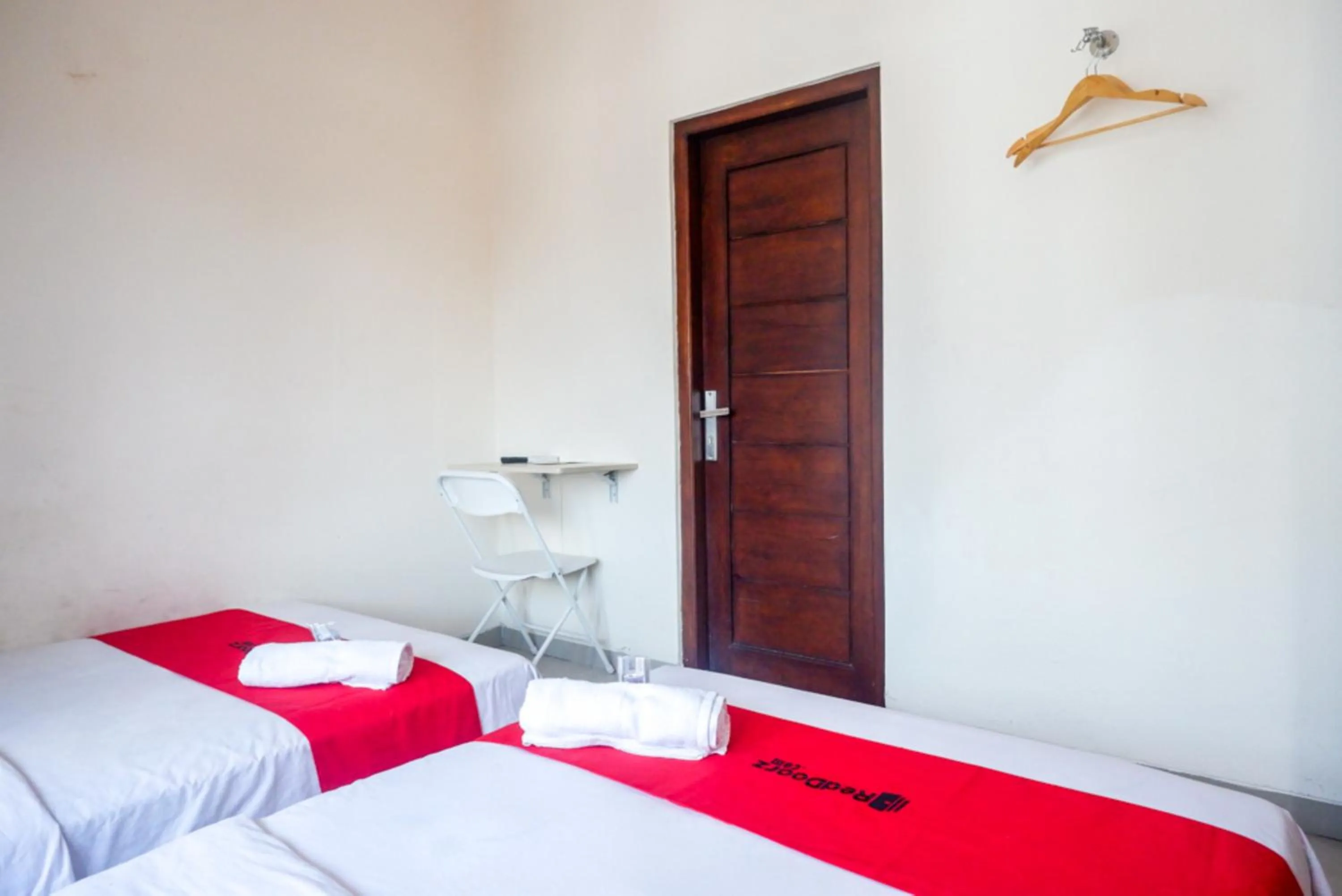 Bed in ReDdoorz At Mahameru Residence Yogyakarta