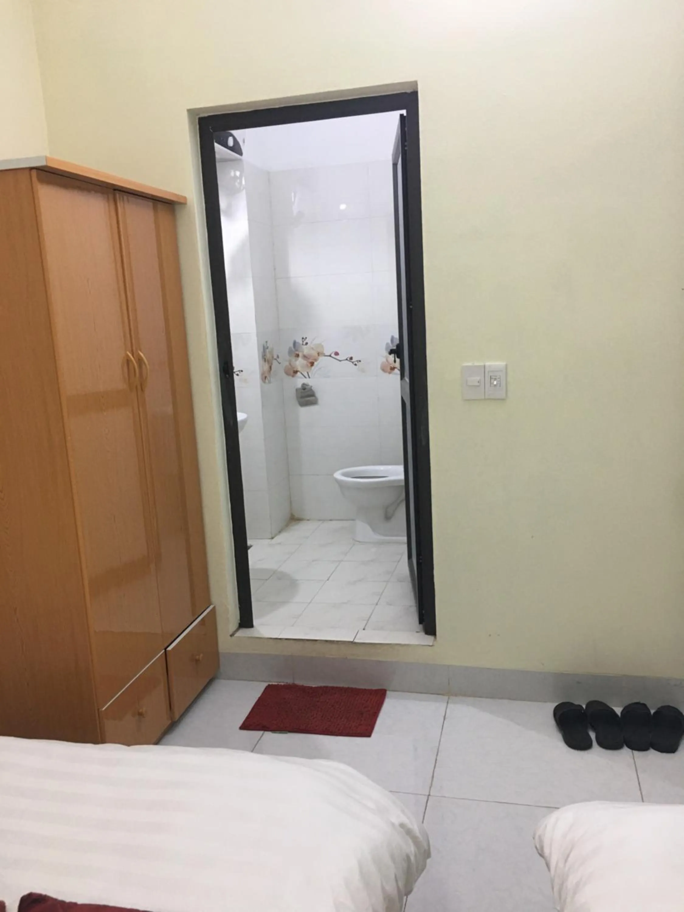 Bed in Duc Thang Guest House (Nhà Nghỉ Đức Thắng)