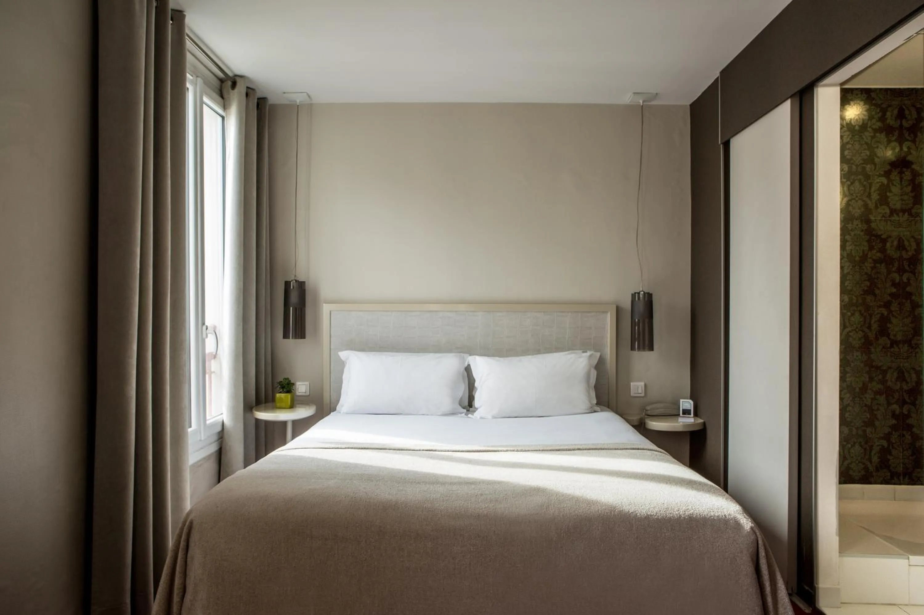 Photo of the whole room, Bed in Le Quartier Bercy-Square