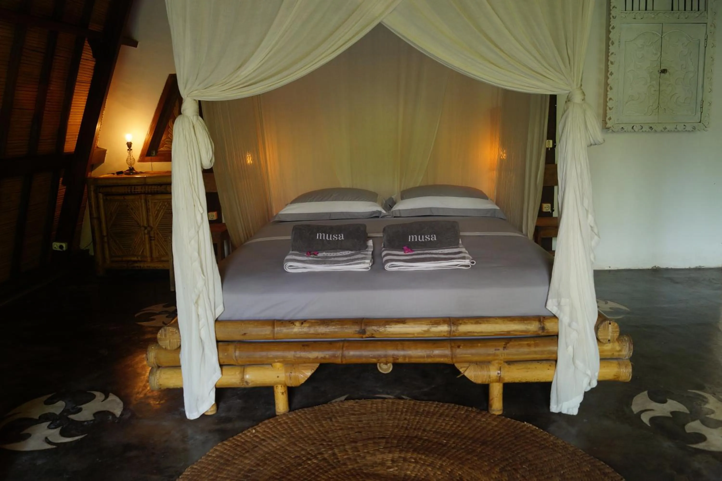 Bed in Musa Villas and Bungalows Gili Air