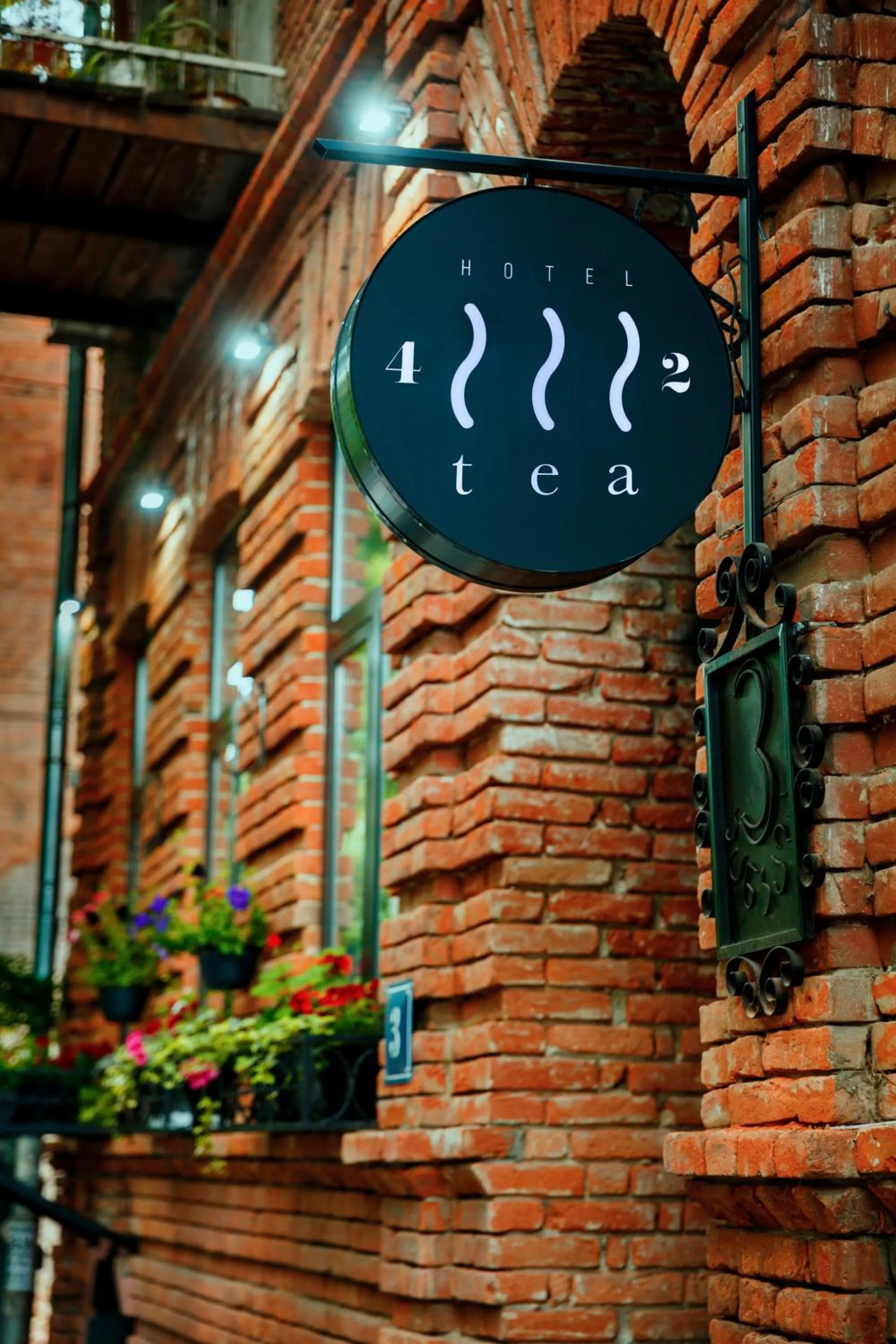 Property logo or sign in Tea for Two Hotel