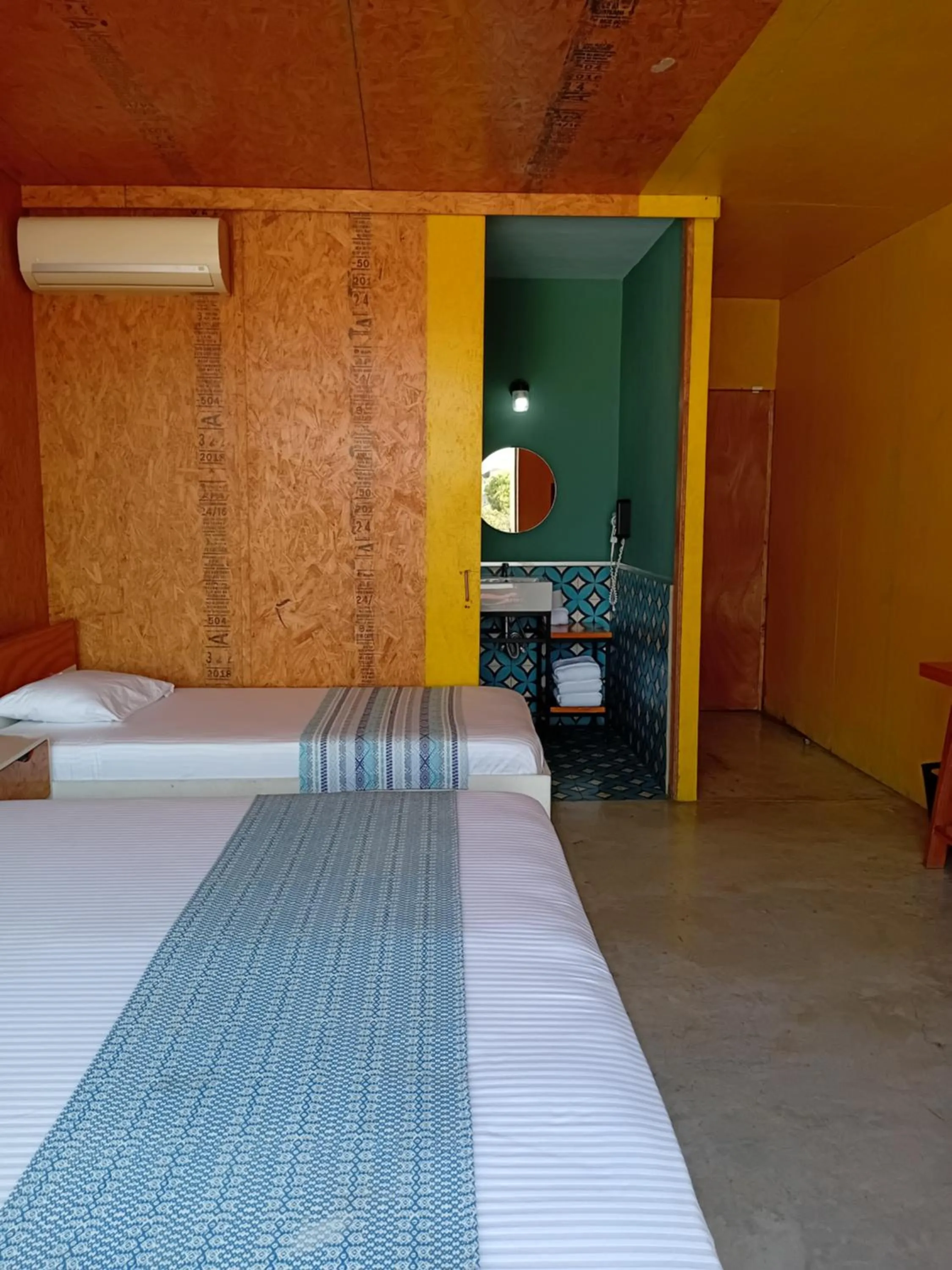 Bed in Hotel Momotus Tuxtla