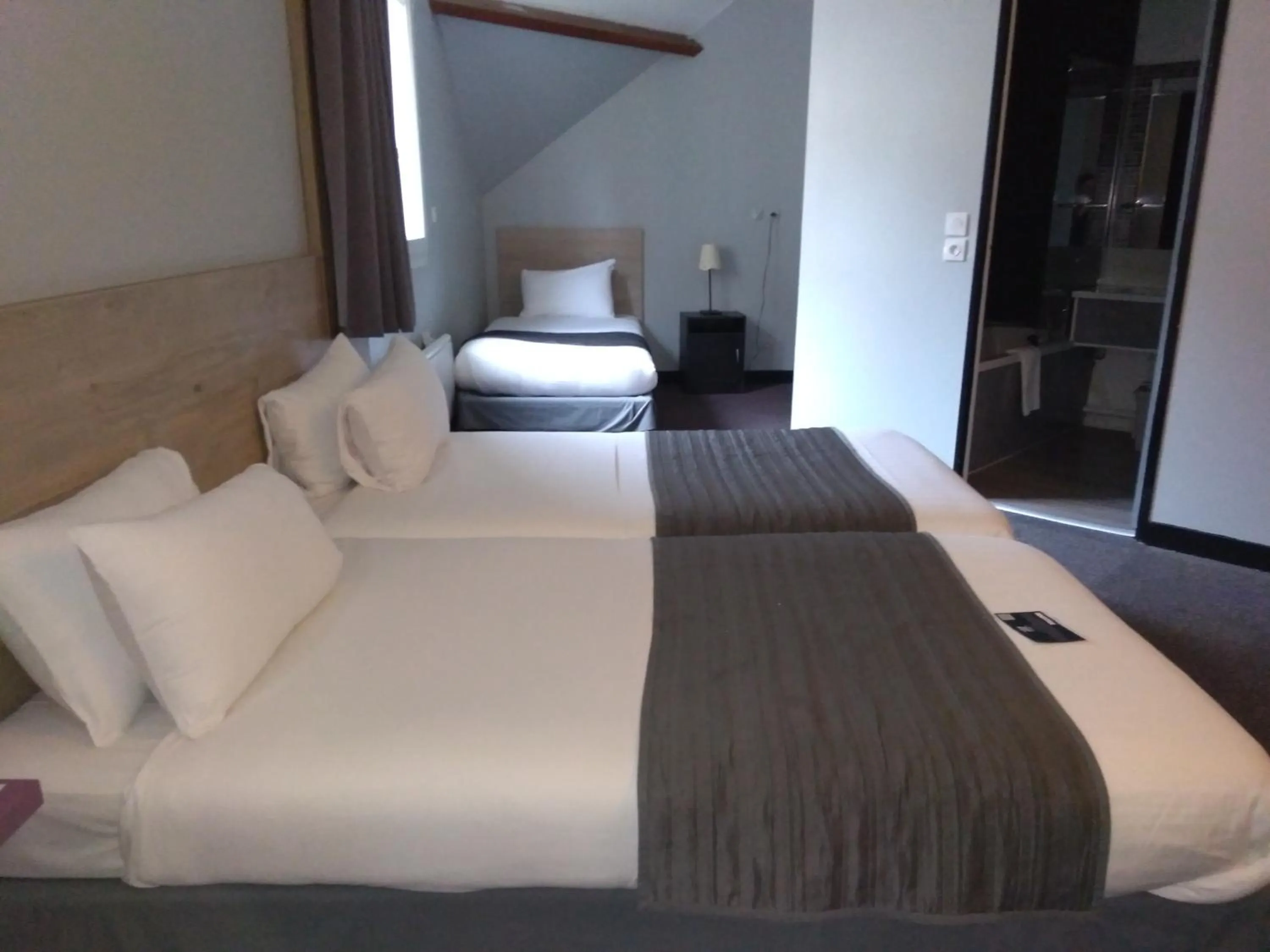 Bed in Kyriad Saint Fargeau Ponthierry - Apollonia