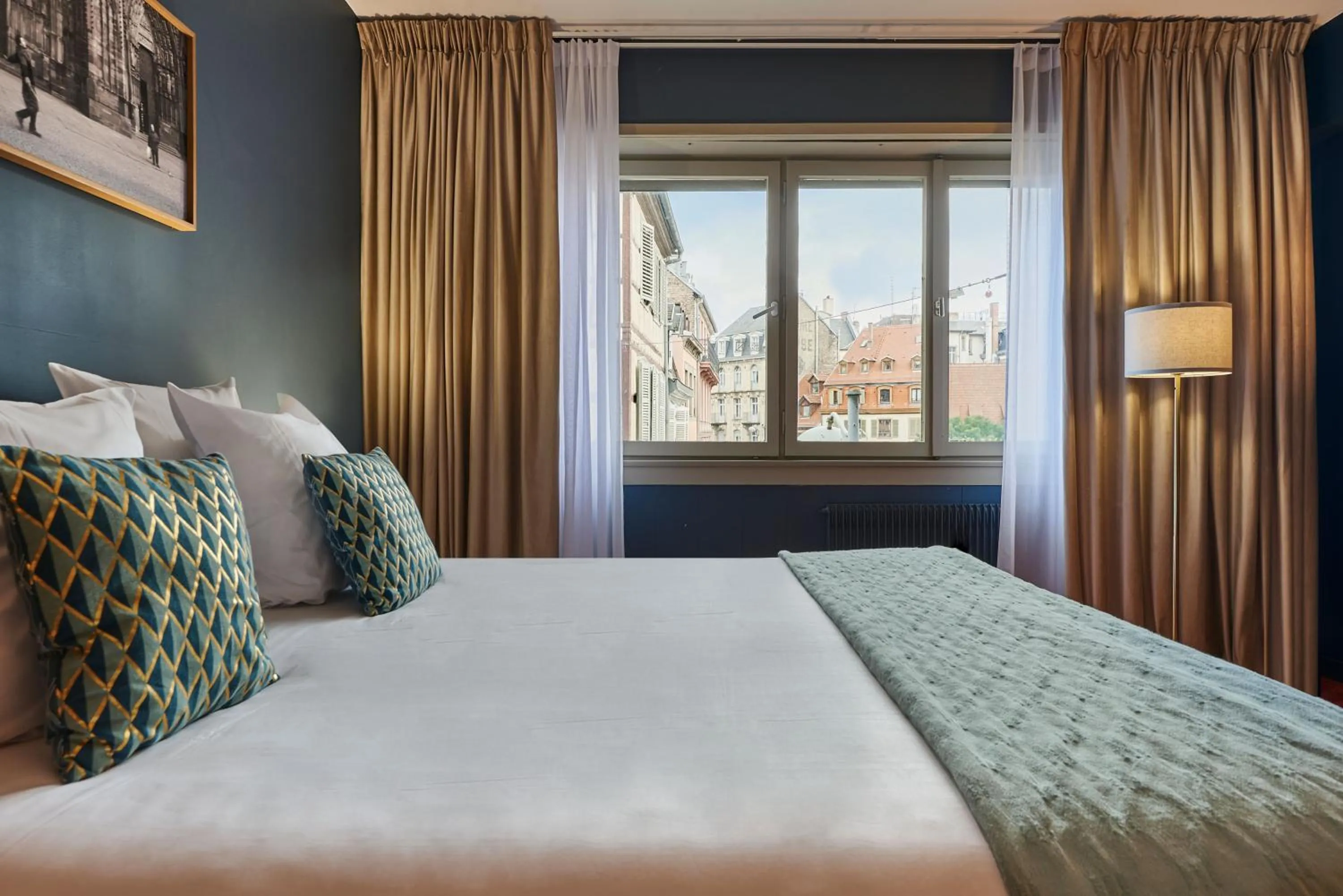 Bed in Hotel Kaijoo by HappyCulture