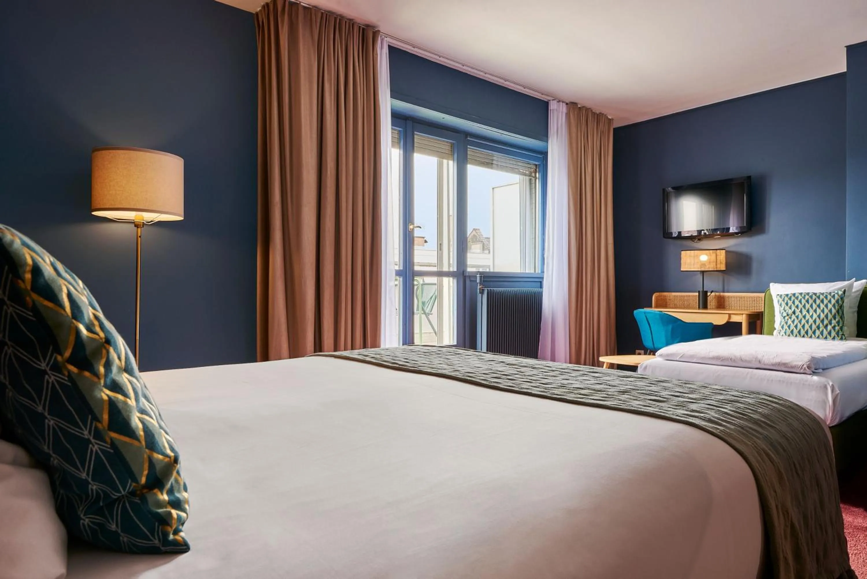 Bed in Hotel Kaijoo by HappyCulture