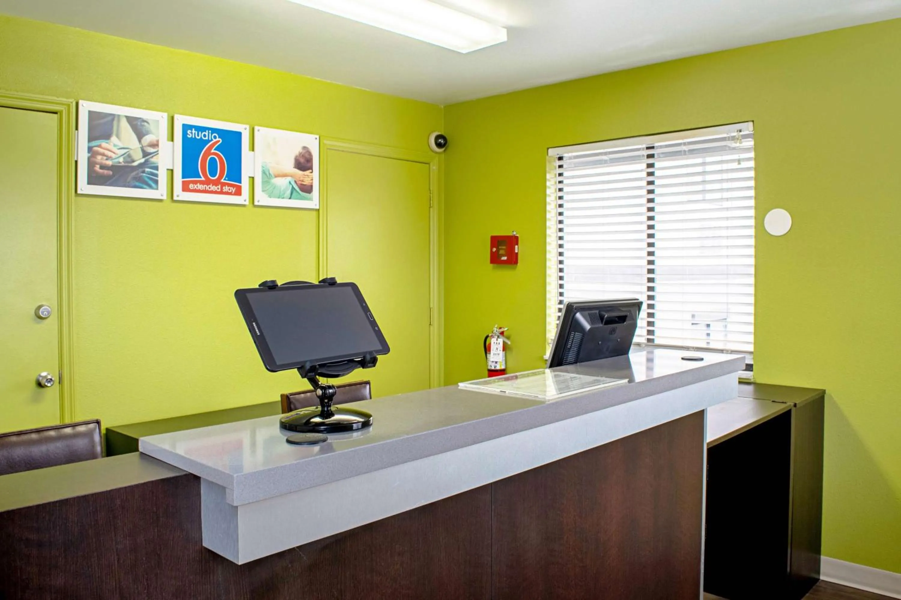 Property logo or sign in Welcome Suites Springdale