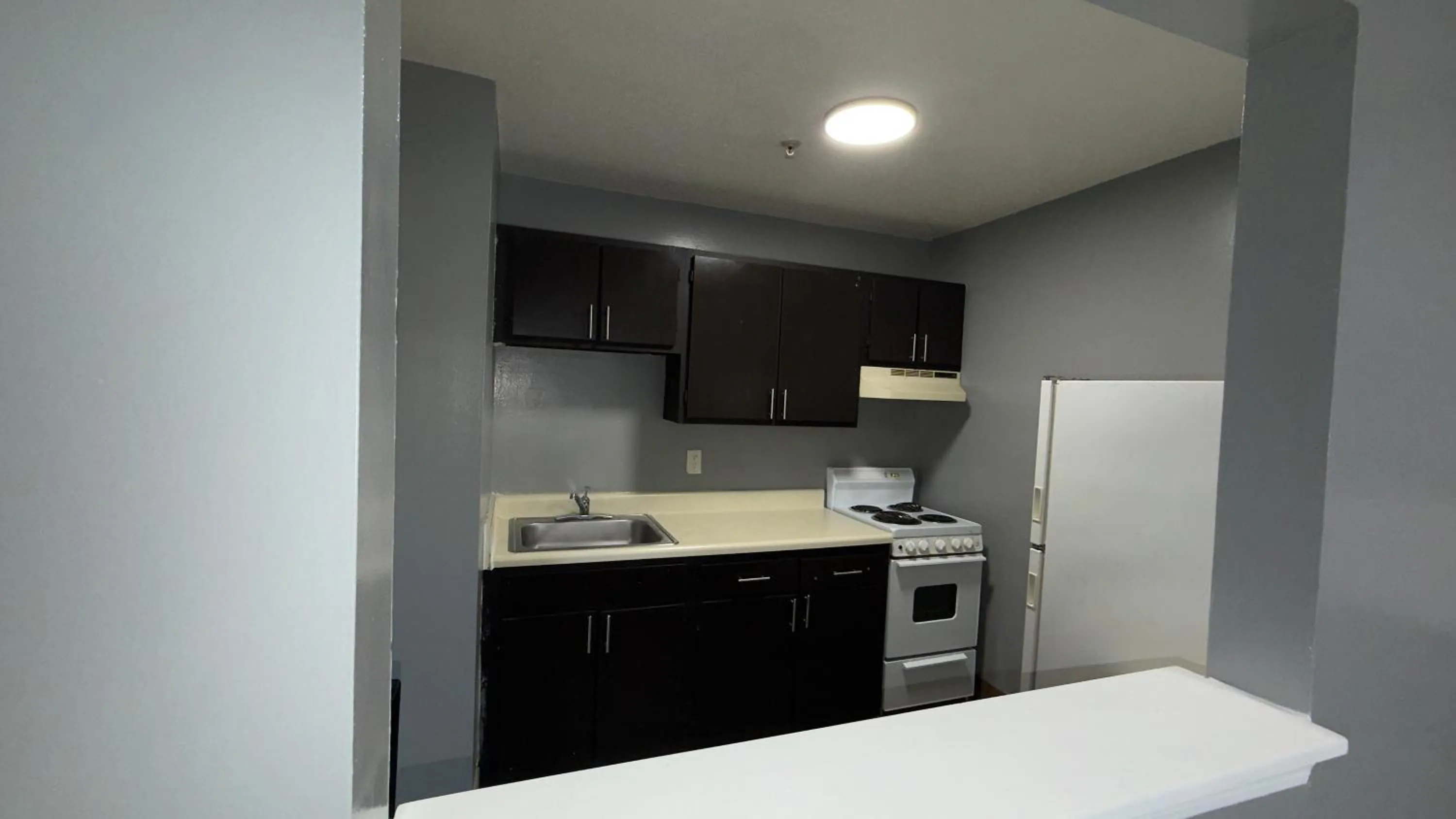 Kitchen or kitchenette in Welcome Suites Hazelwood Extended Stay Hotel
