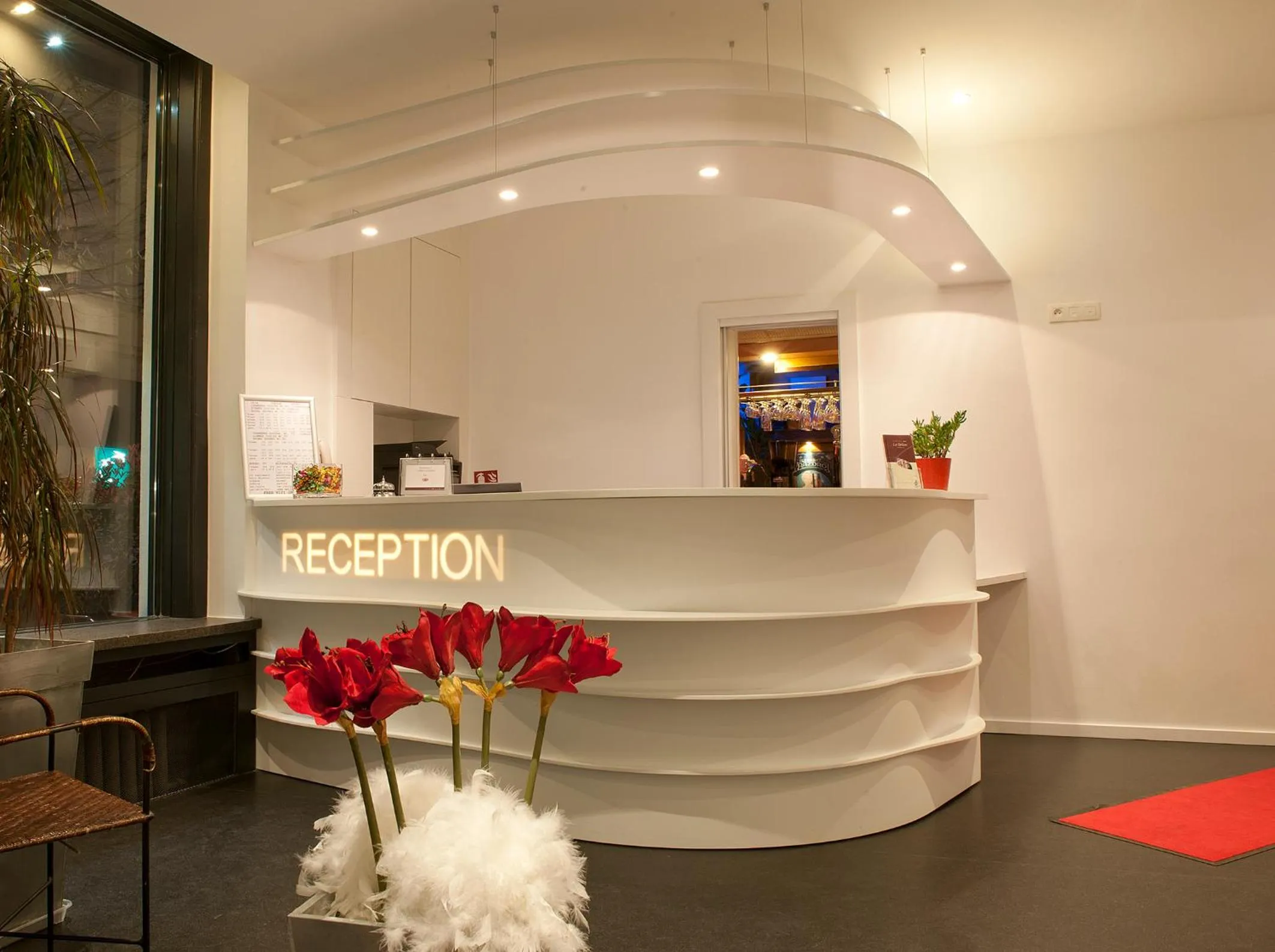 Lobby or reception in Hôtel le Grillon