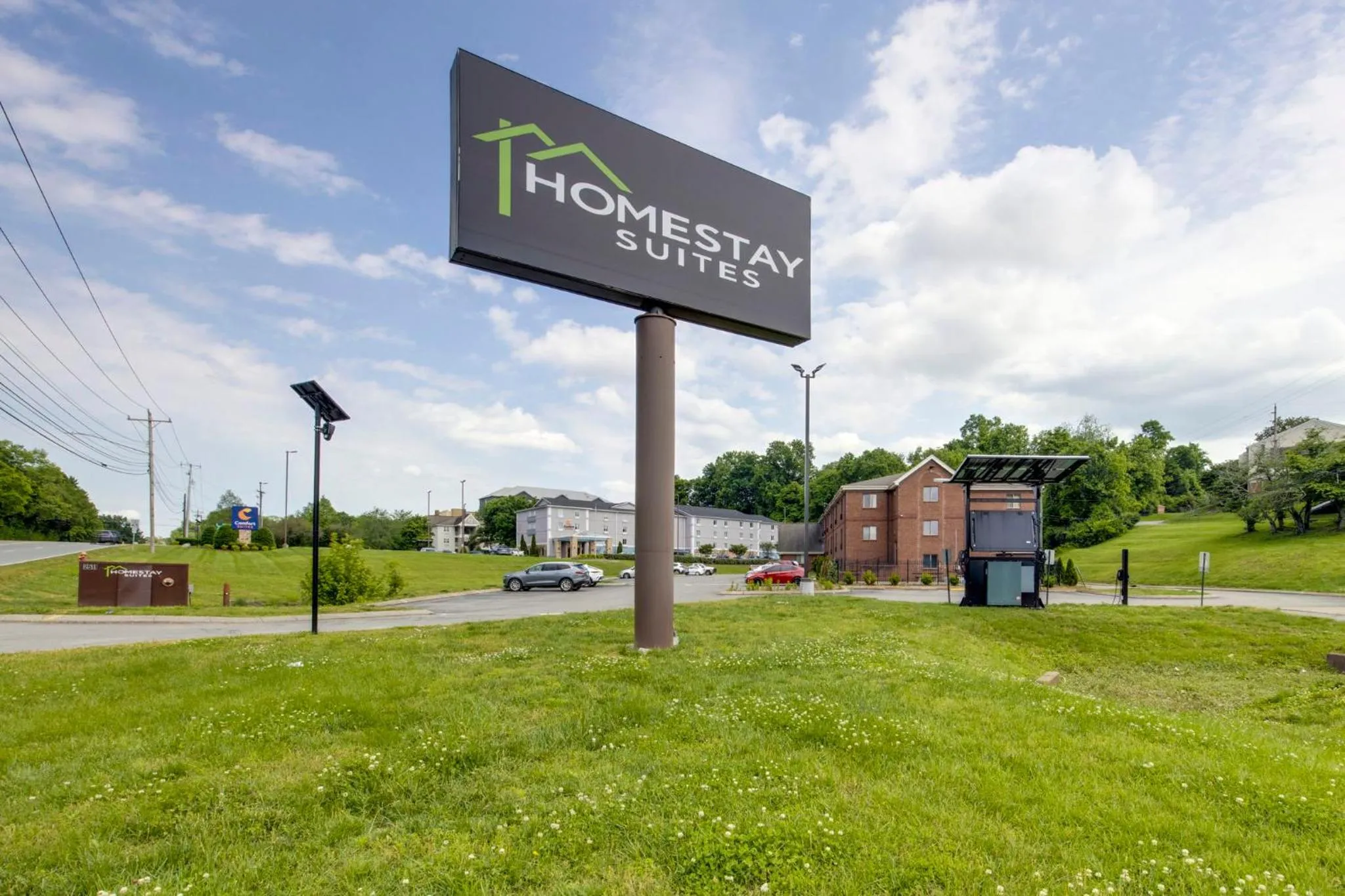 Property logo or sign in HomeStay Suites