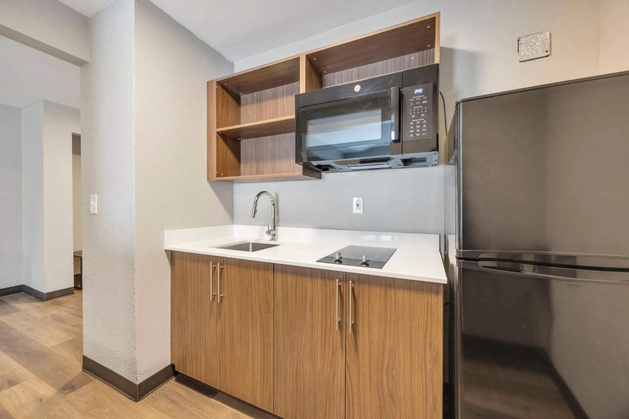 Kitchen or kitchenette in HomeStay Suites