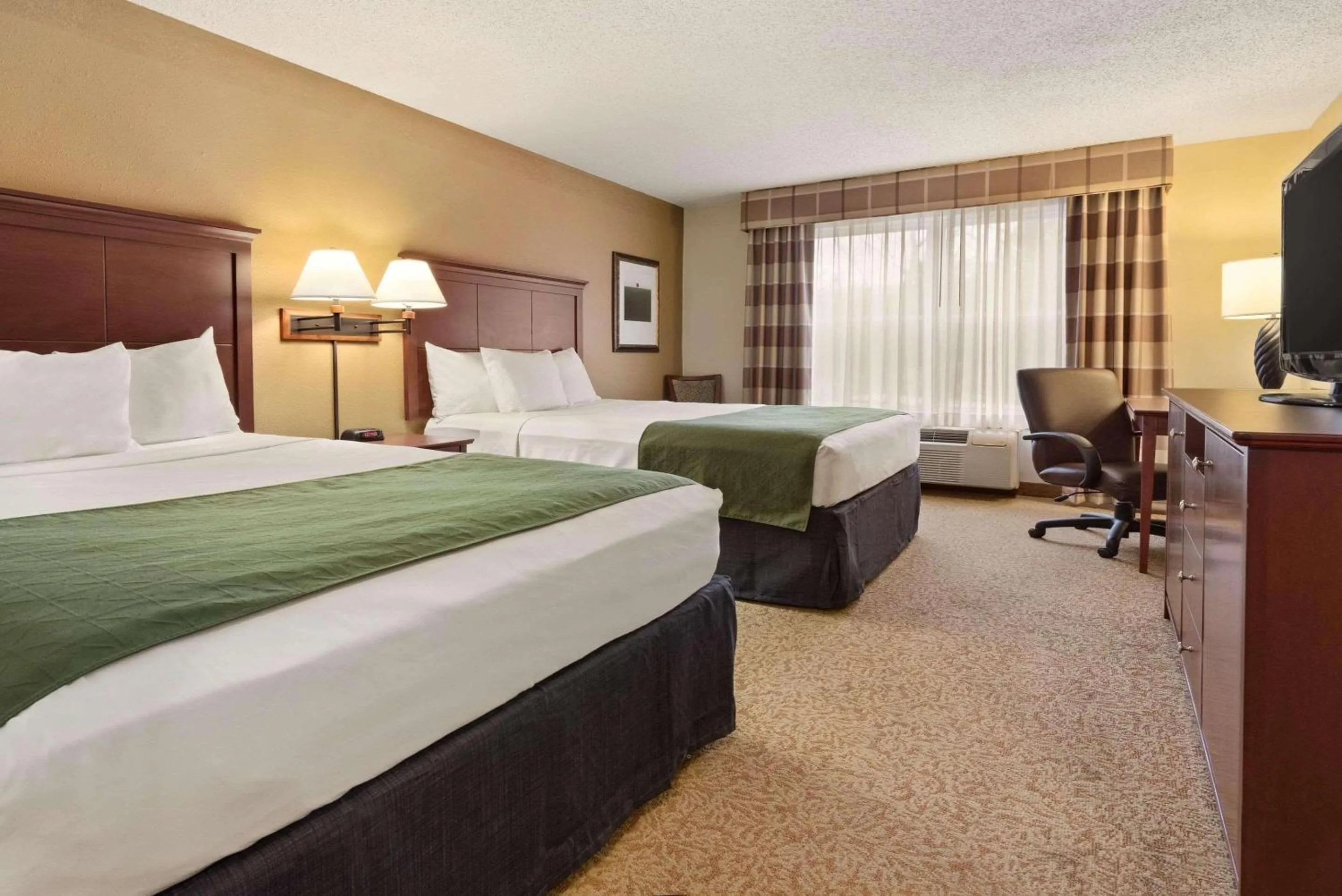 Bedroom, Bed in Country Inn & Suites by Radisson, Stevens Point, WI