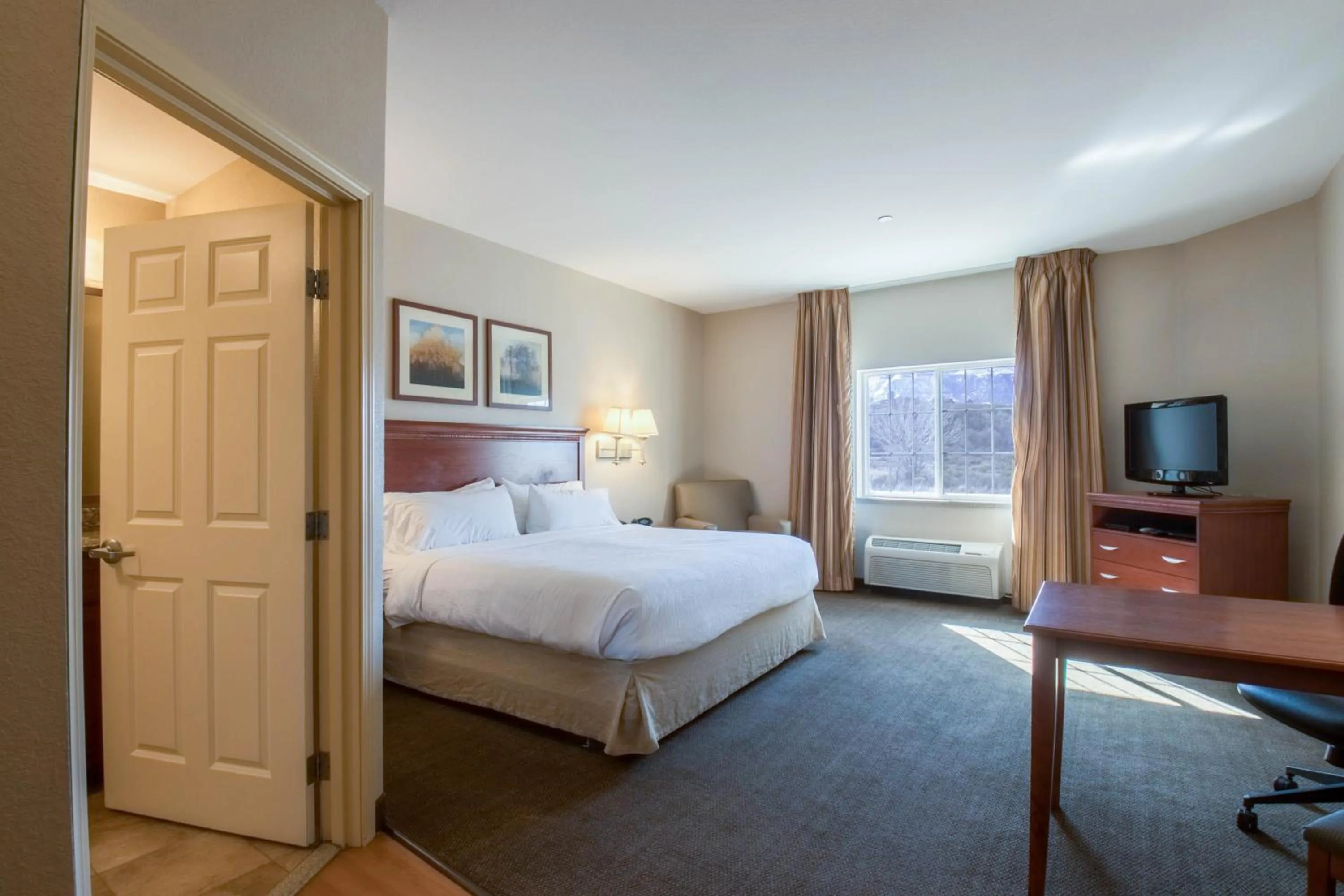 Bed in Western Slope Suites Parachute