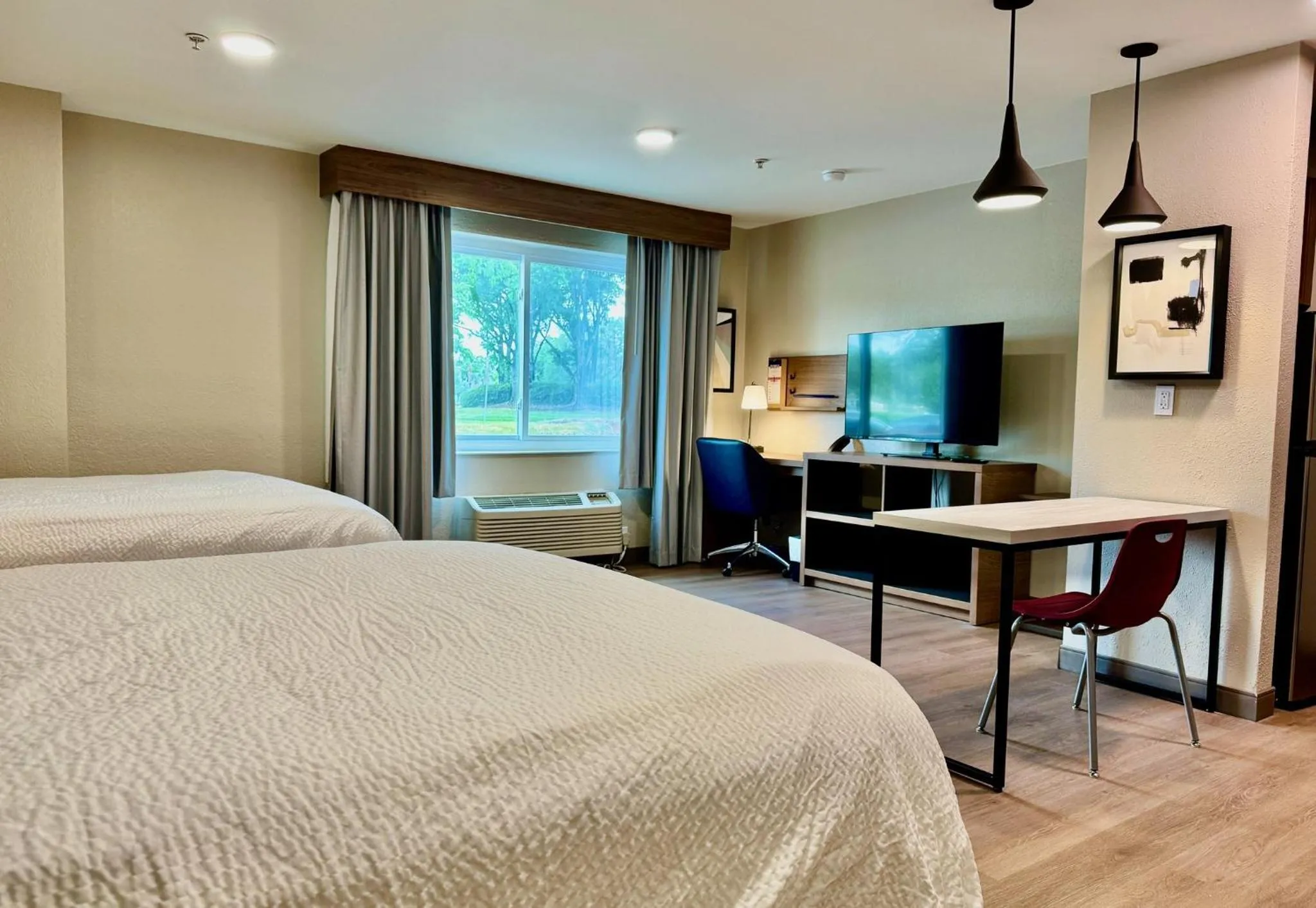 Photo of the whole room, Bed in Candlewood Suites Jacksonville Southpoint