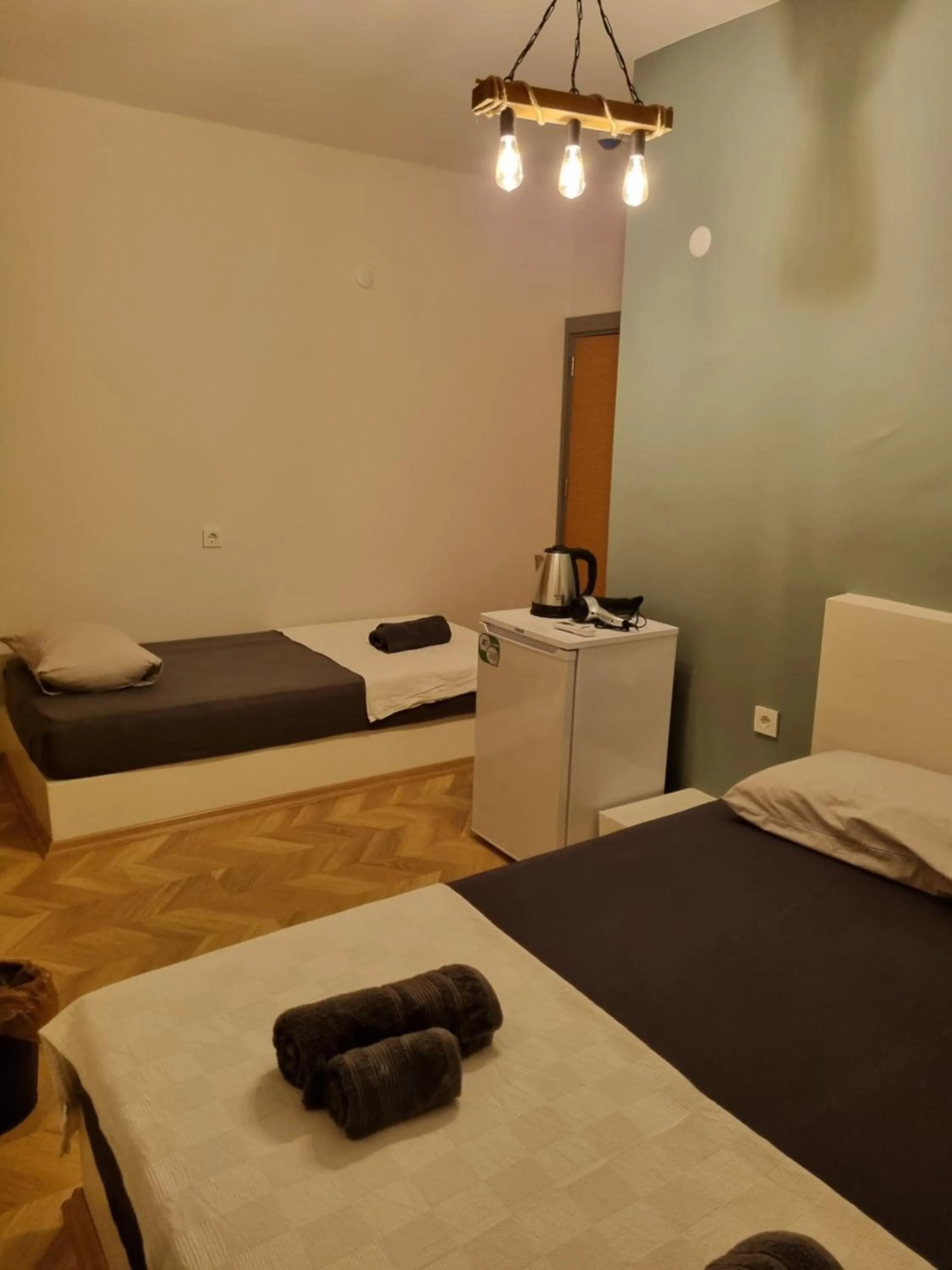 Bed in El Mundo Suites