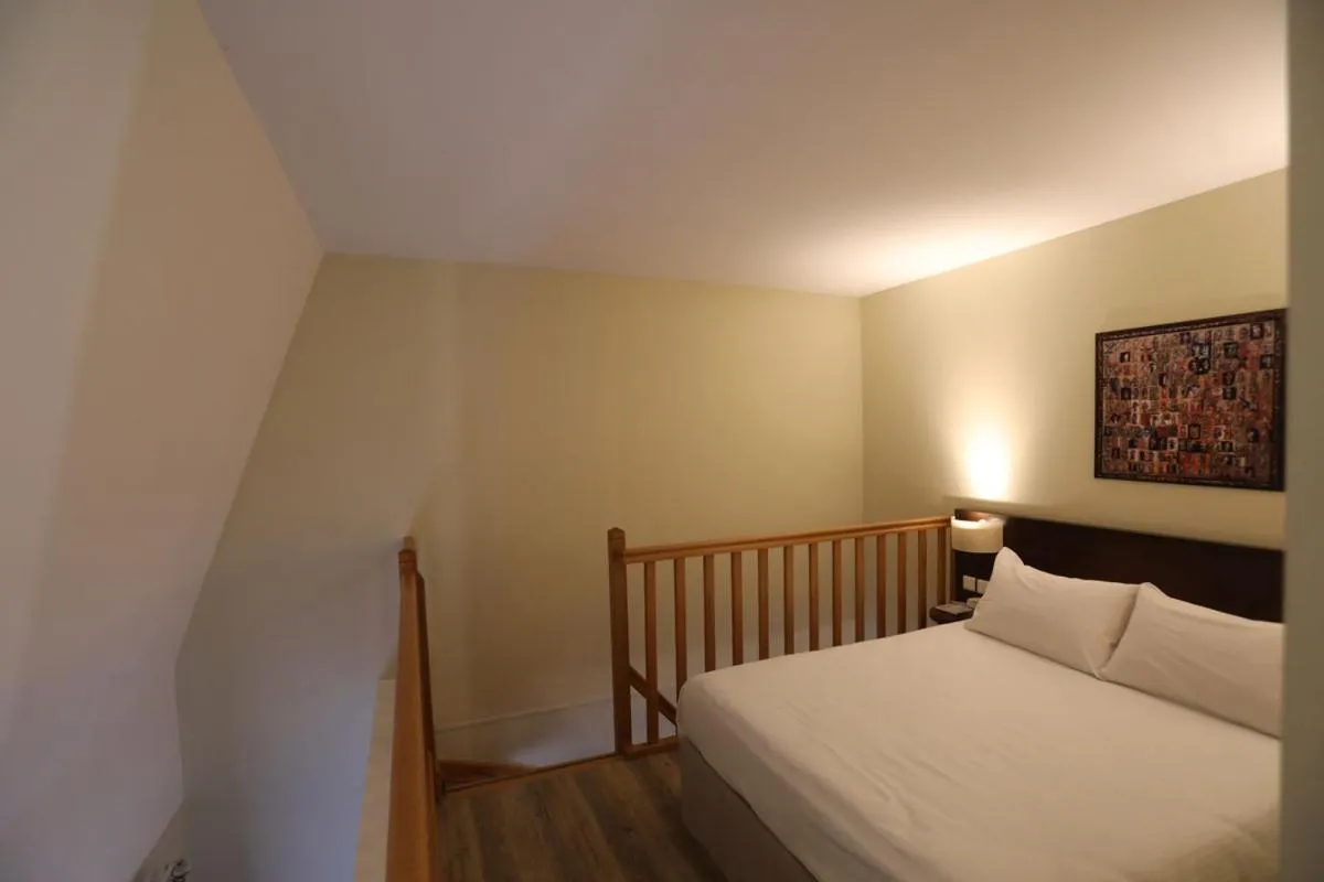 Bed in Hôtel de l'Abbaye des Prémontrés