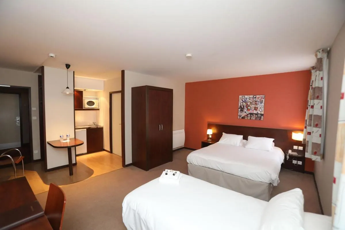 Bed in Hôtel de l'Abbaye des Prémontrés