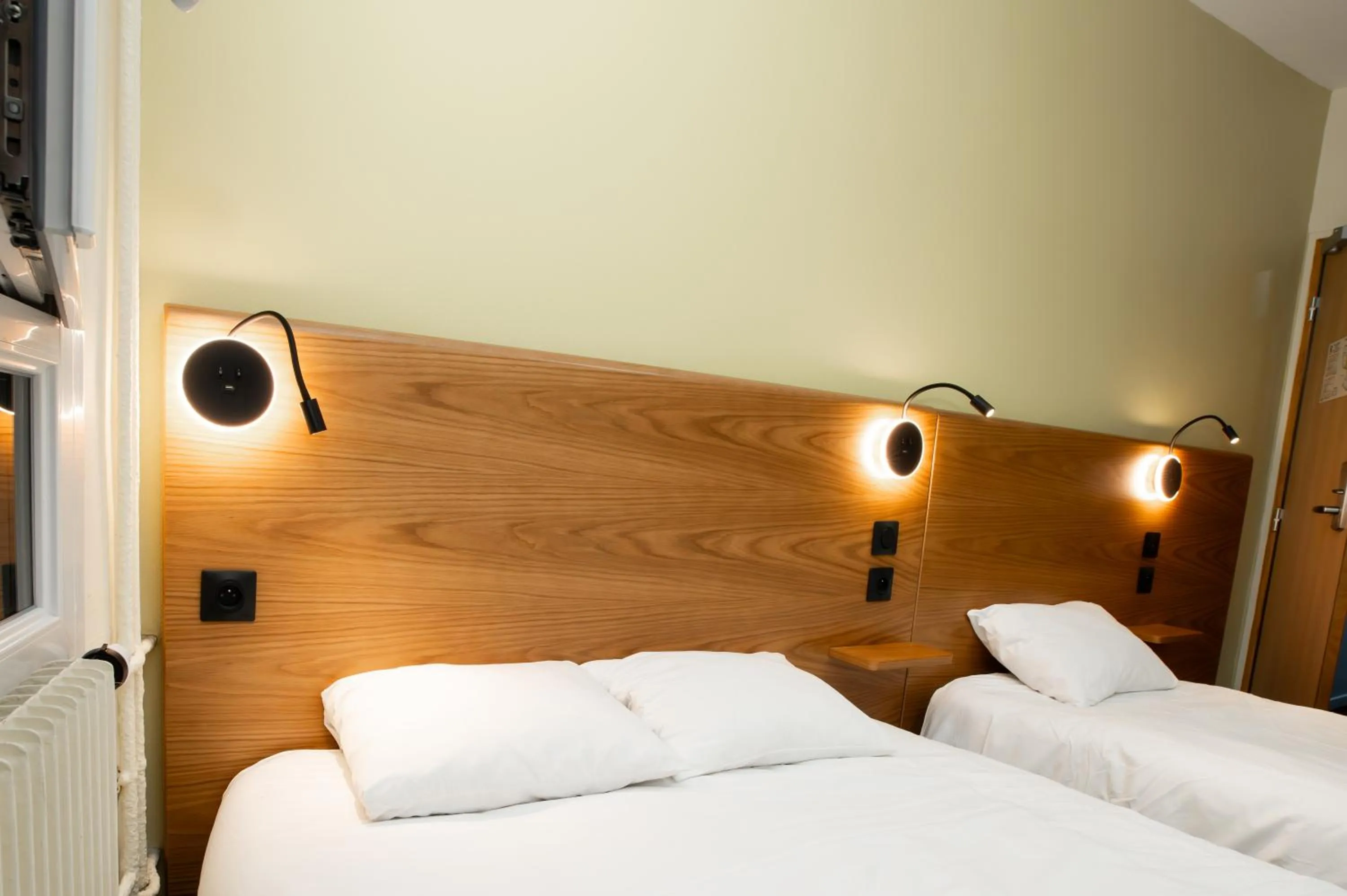 Bed in Hôtel de la Terrasse