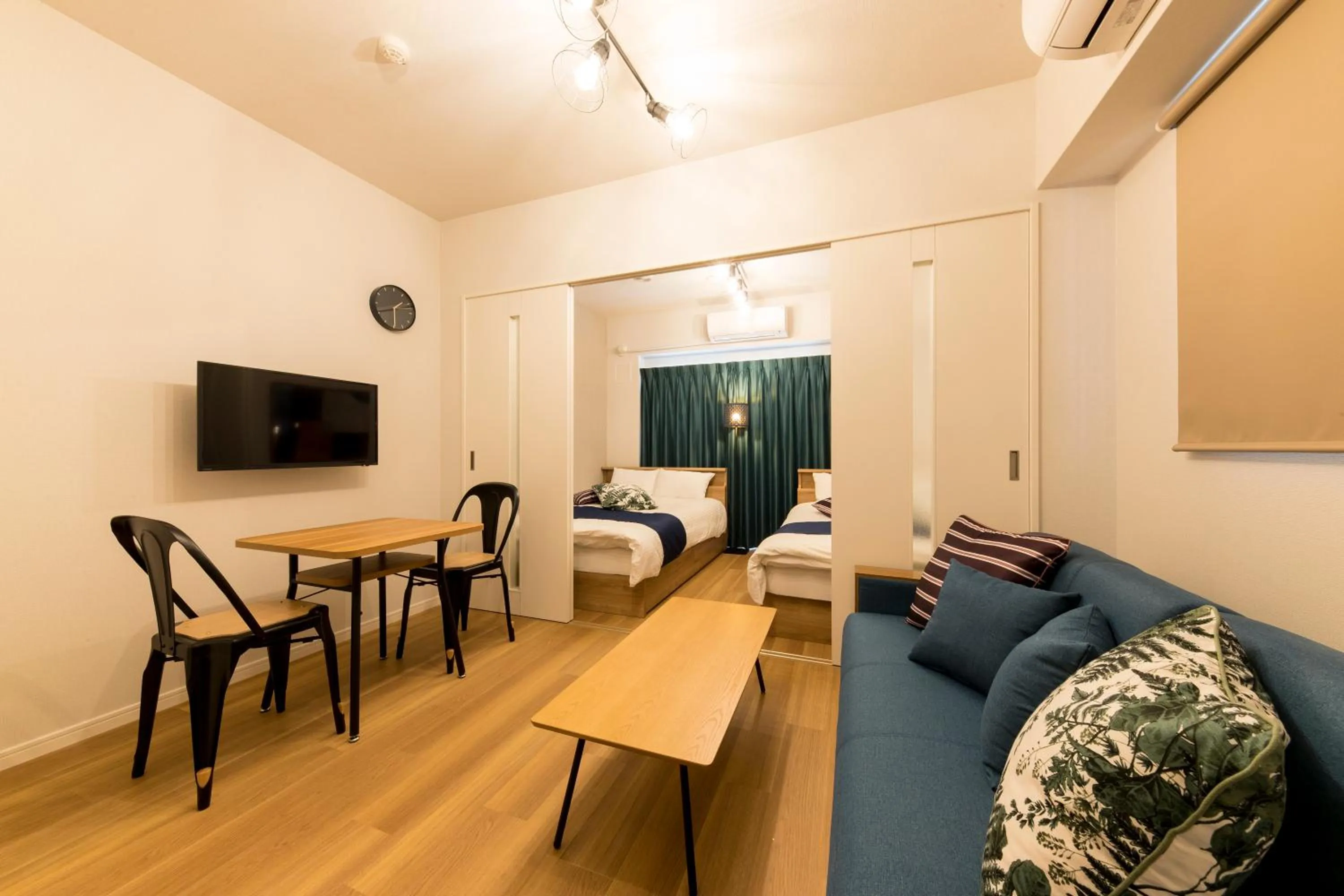 Living room, Bed in SG RESIDENCE INN HAKATA