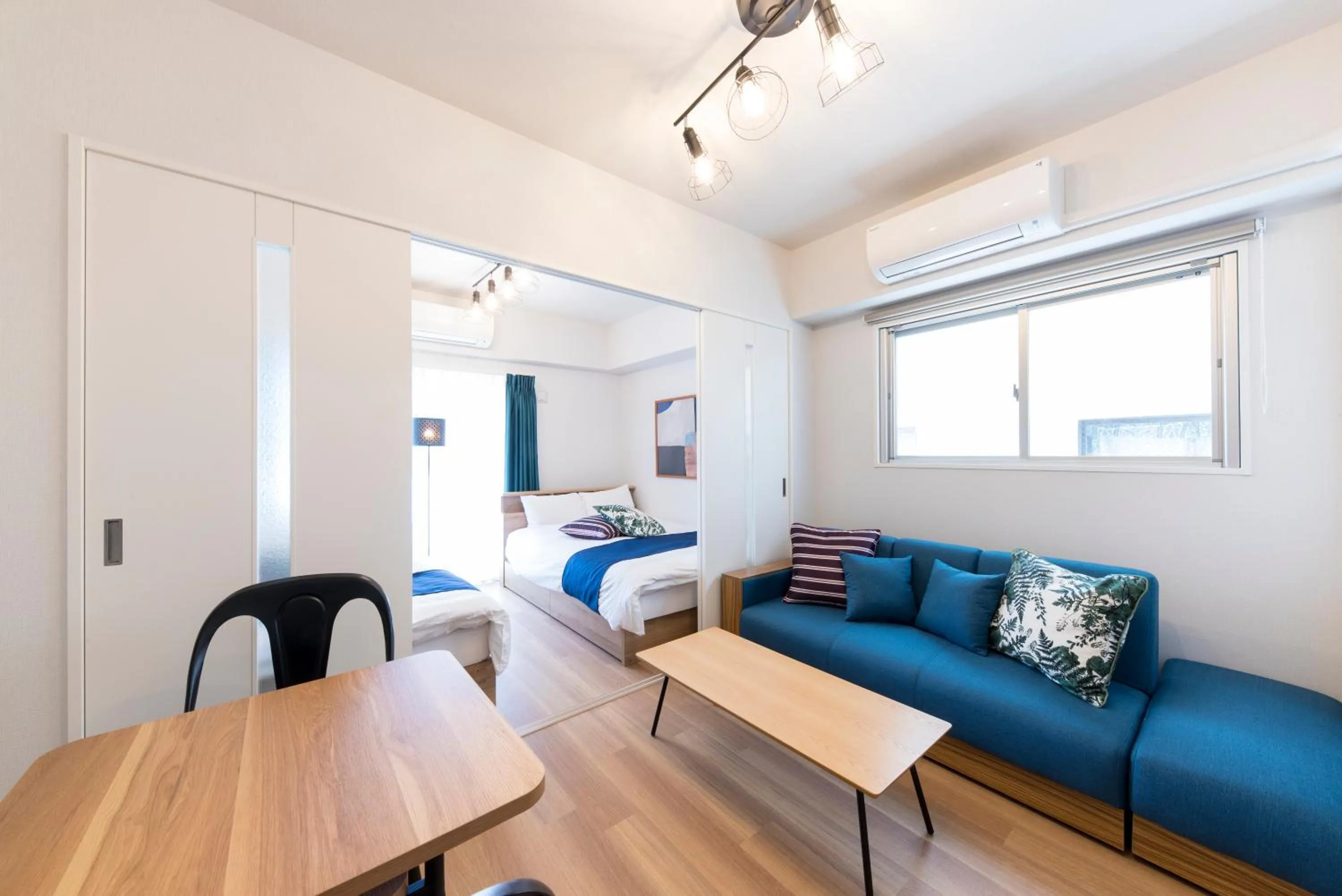 Living room, Bed in SG RESIDENCE INN HAKATA